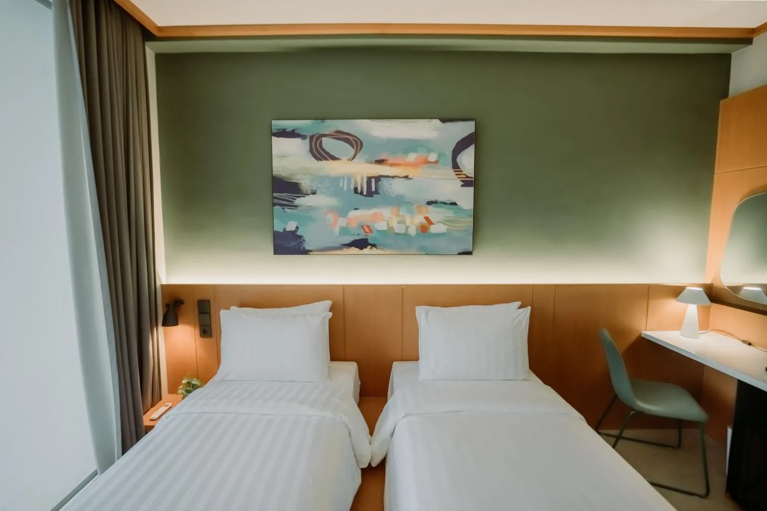Bed in Jiro Hotel