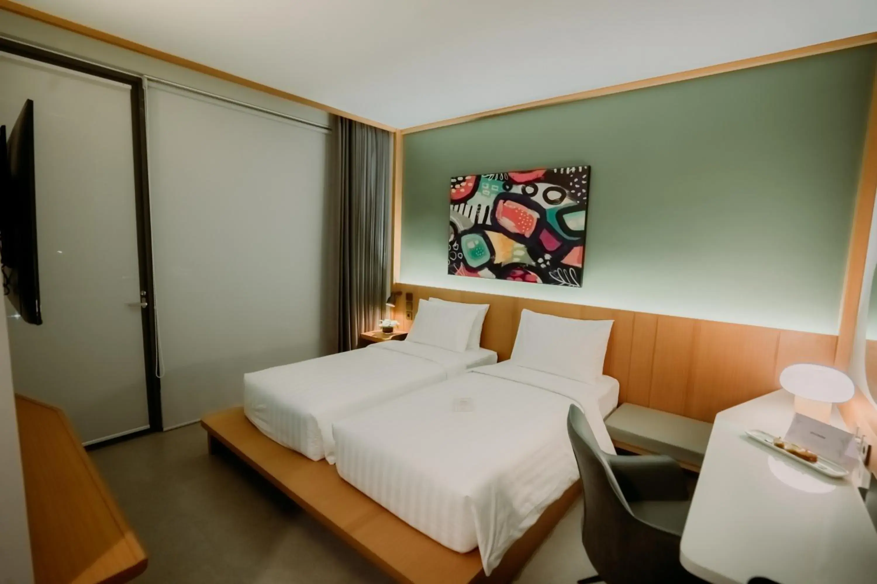 Bed in Jiro Hotel Bed in Jiro Hotel