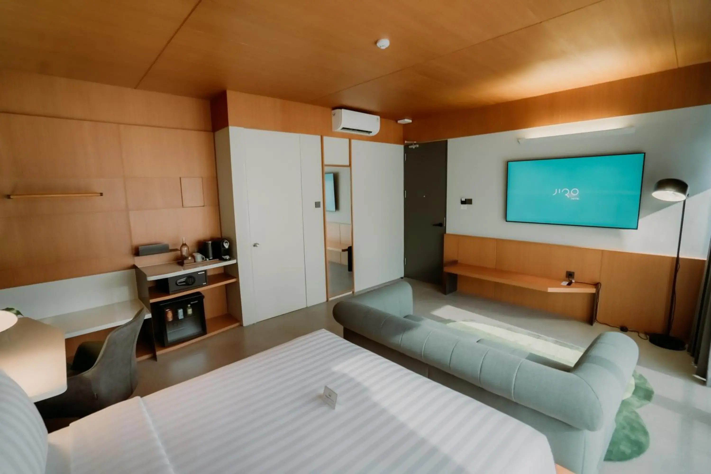 Bed in Jiro Hotel Bed in Jiro Hotel