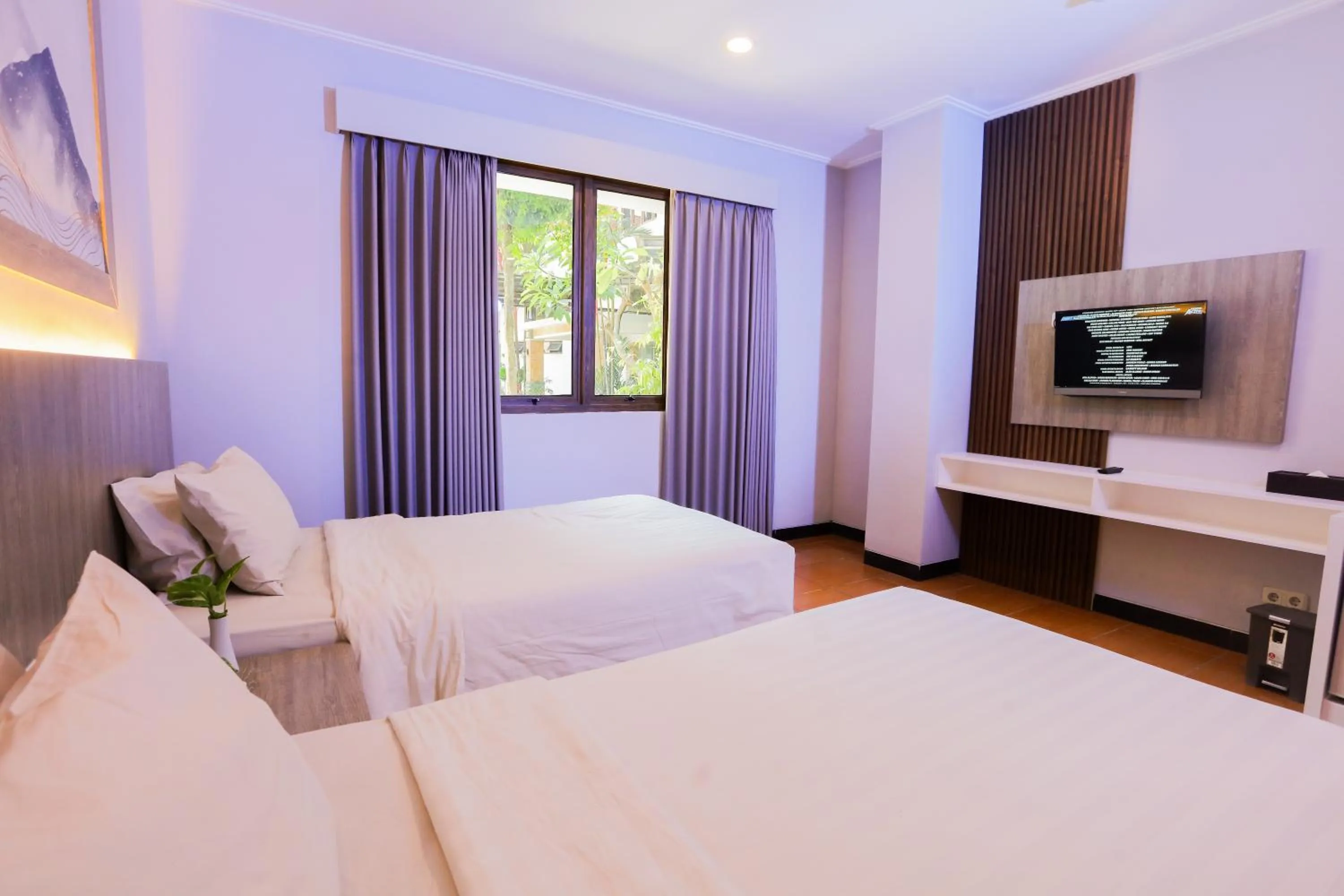 Communal lounge/ TV room, Bed in Front One HK Resort Simpang Lima