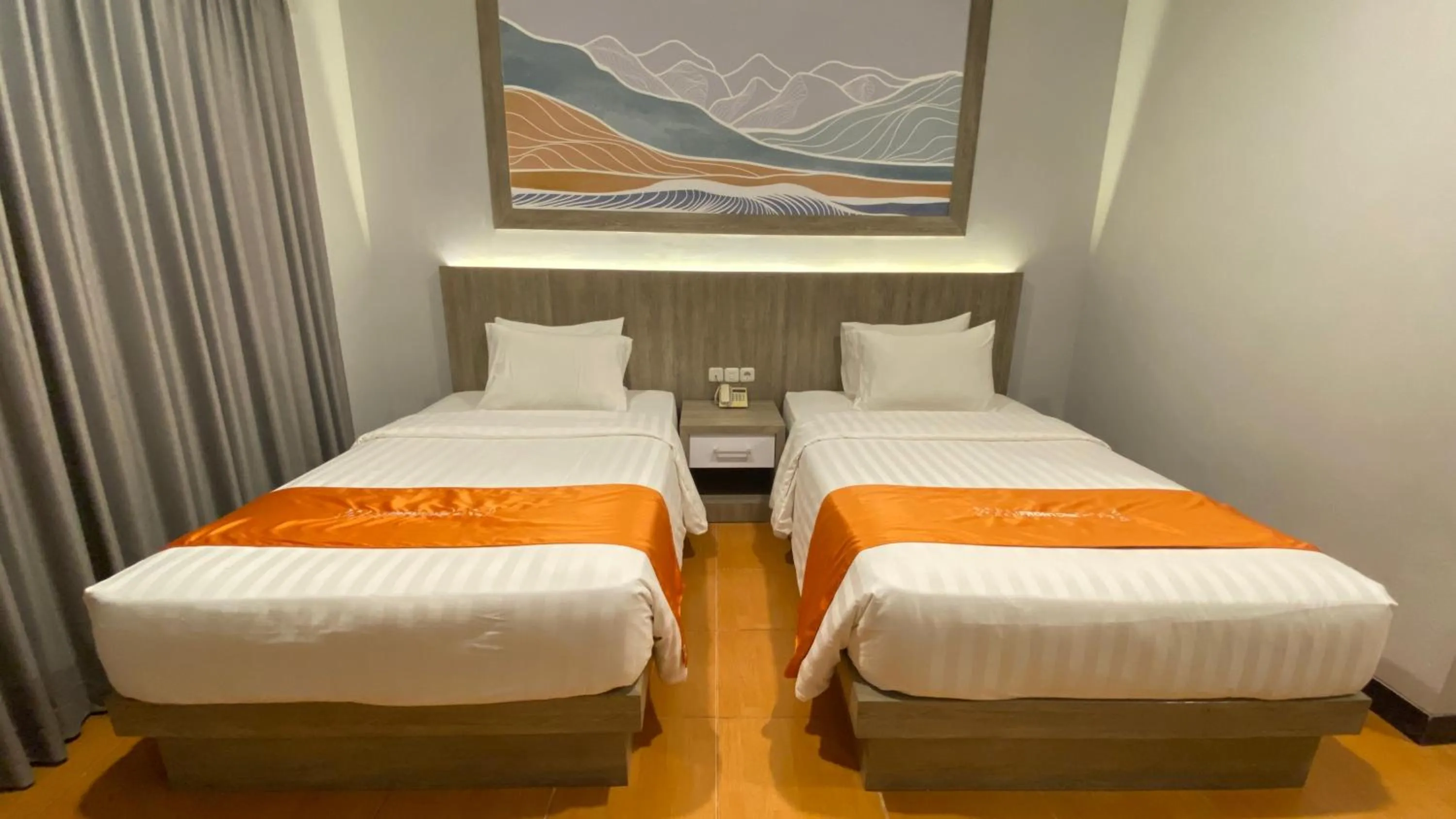 Bedroom, Bed in Front One HK Resort Simpang Lima