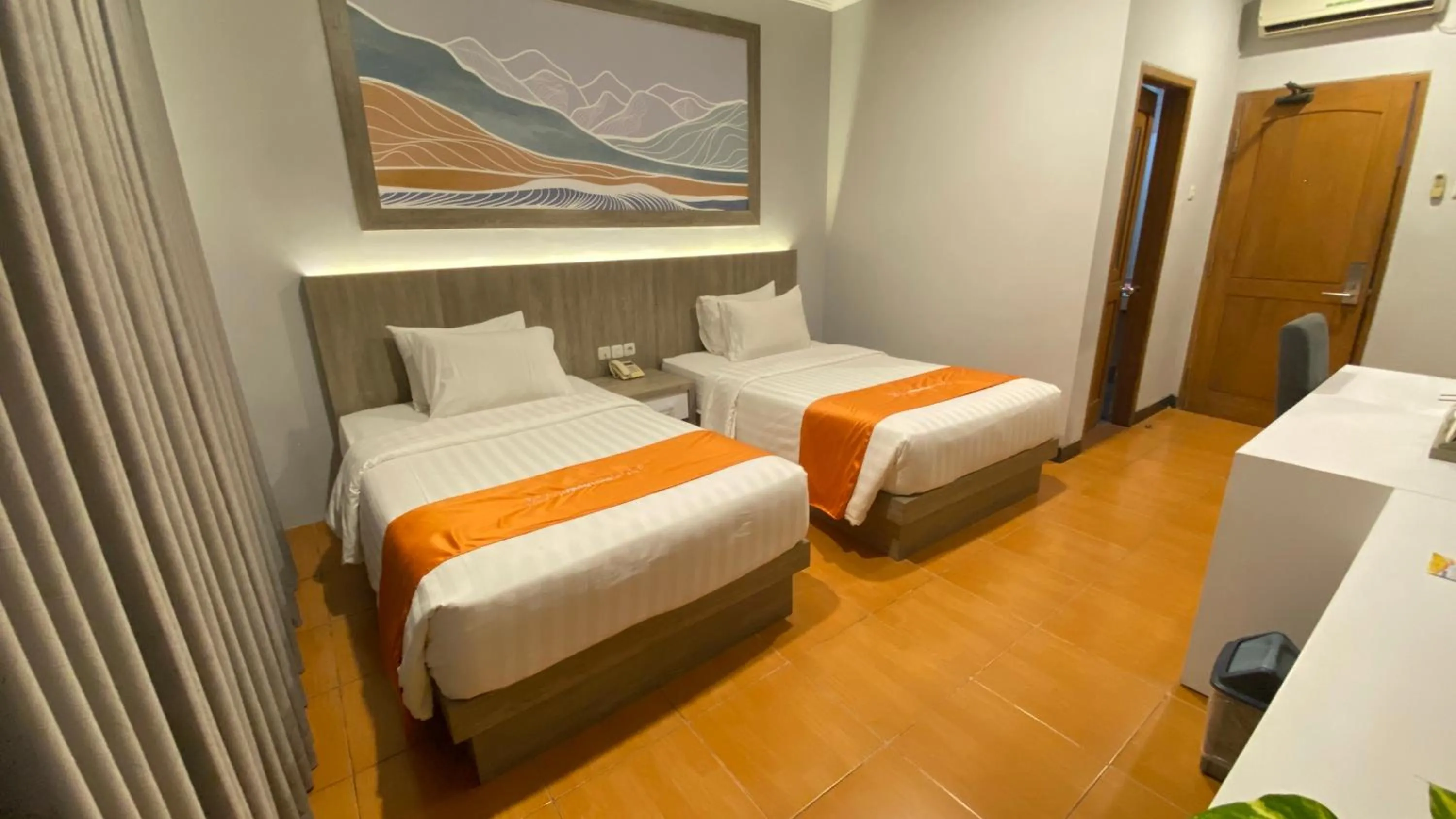 Bedroom, Bed in Front One HK Resort Simpang Lima
