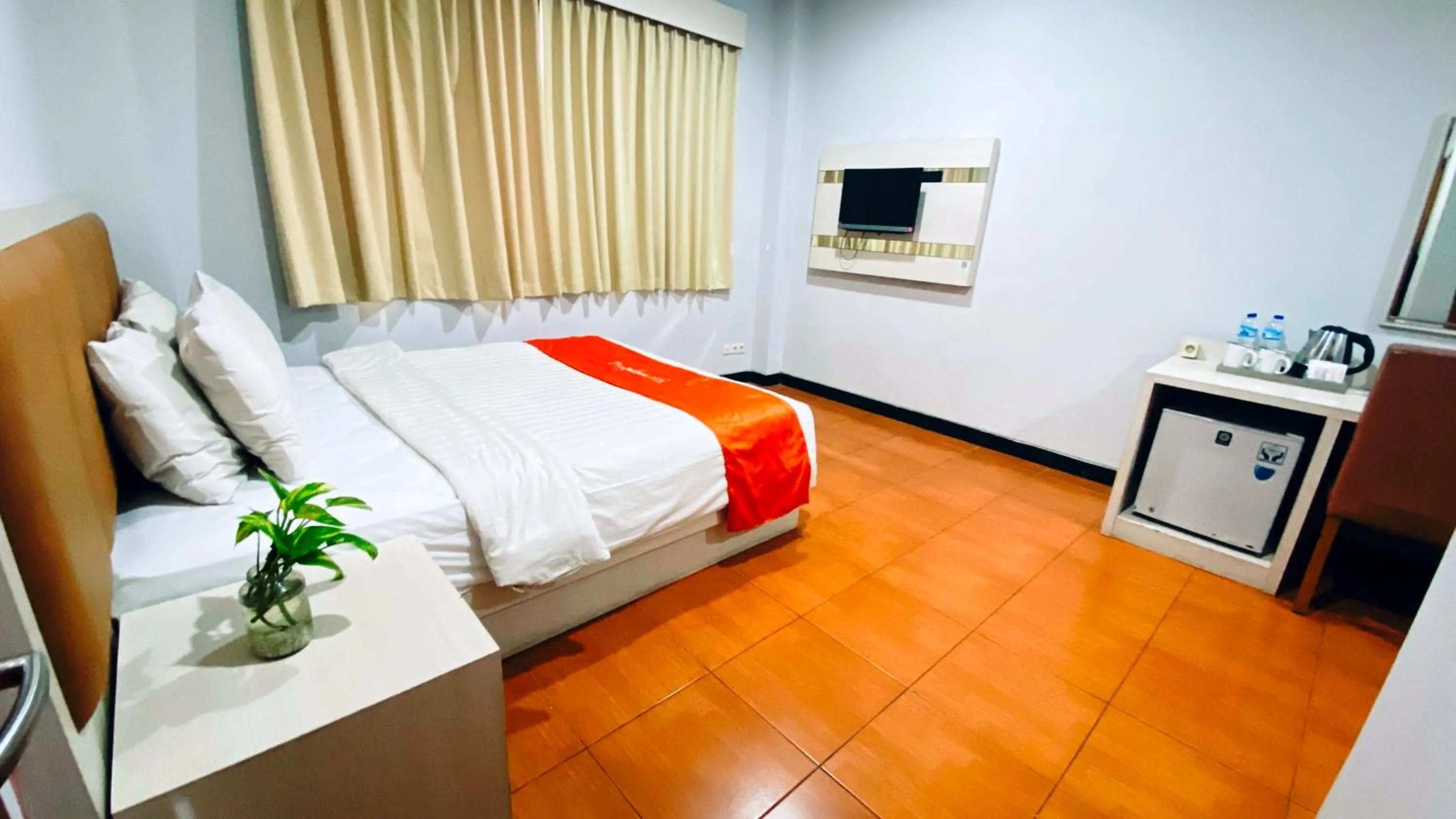 Bedroom, Bed in Front One HK Resort Simpang Lima