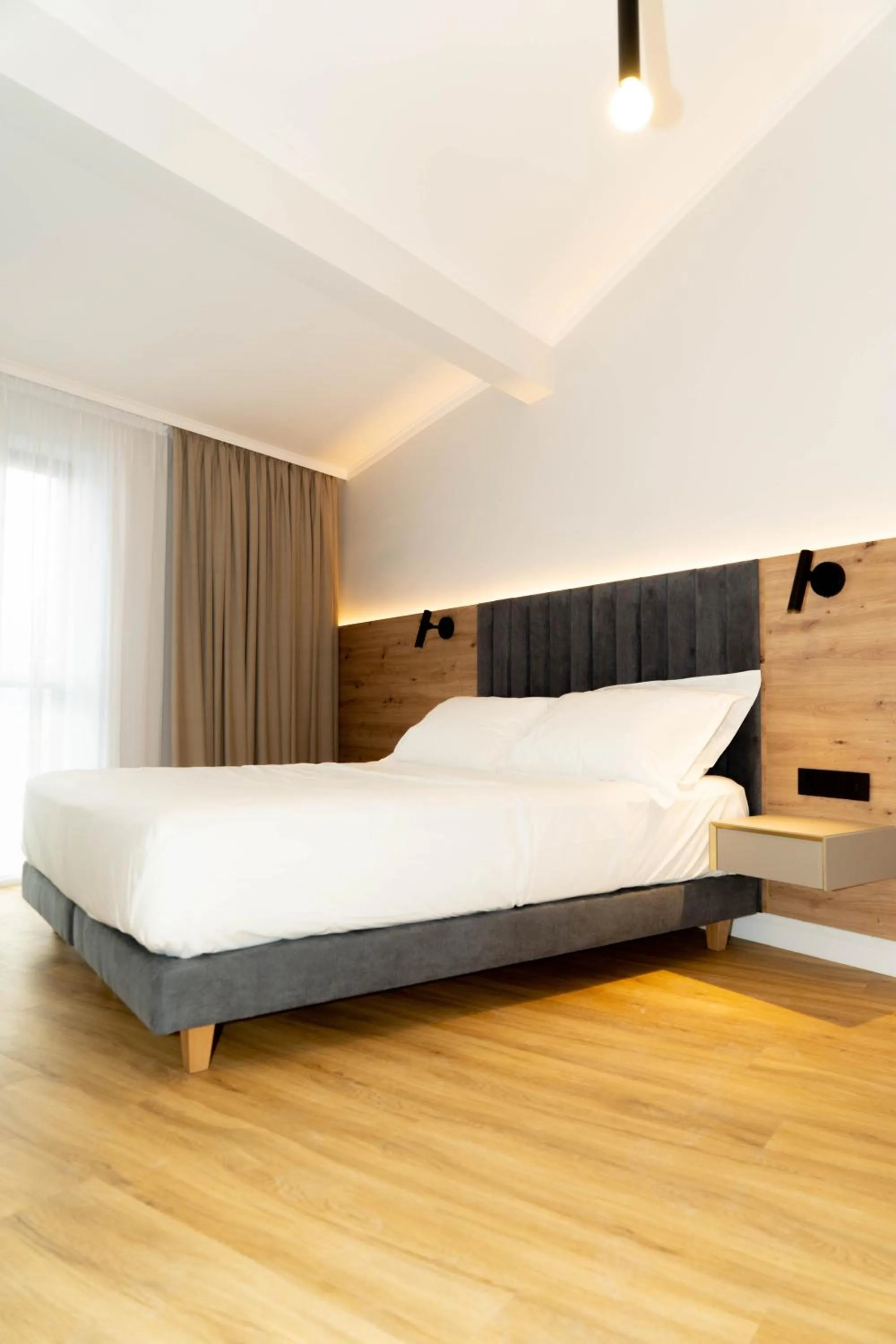 Bed in Bloom Downtown Suites
