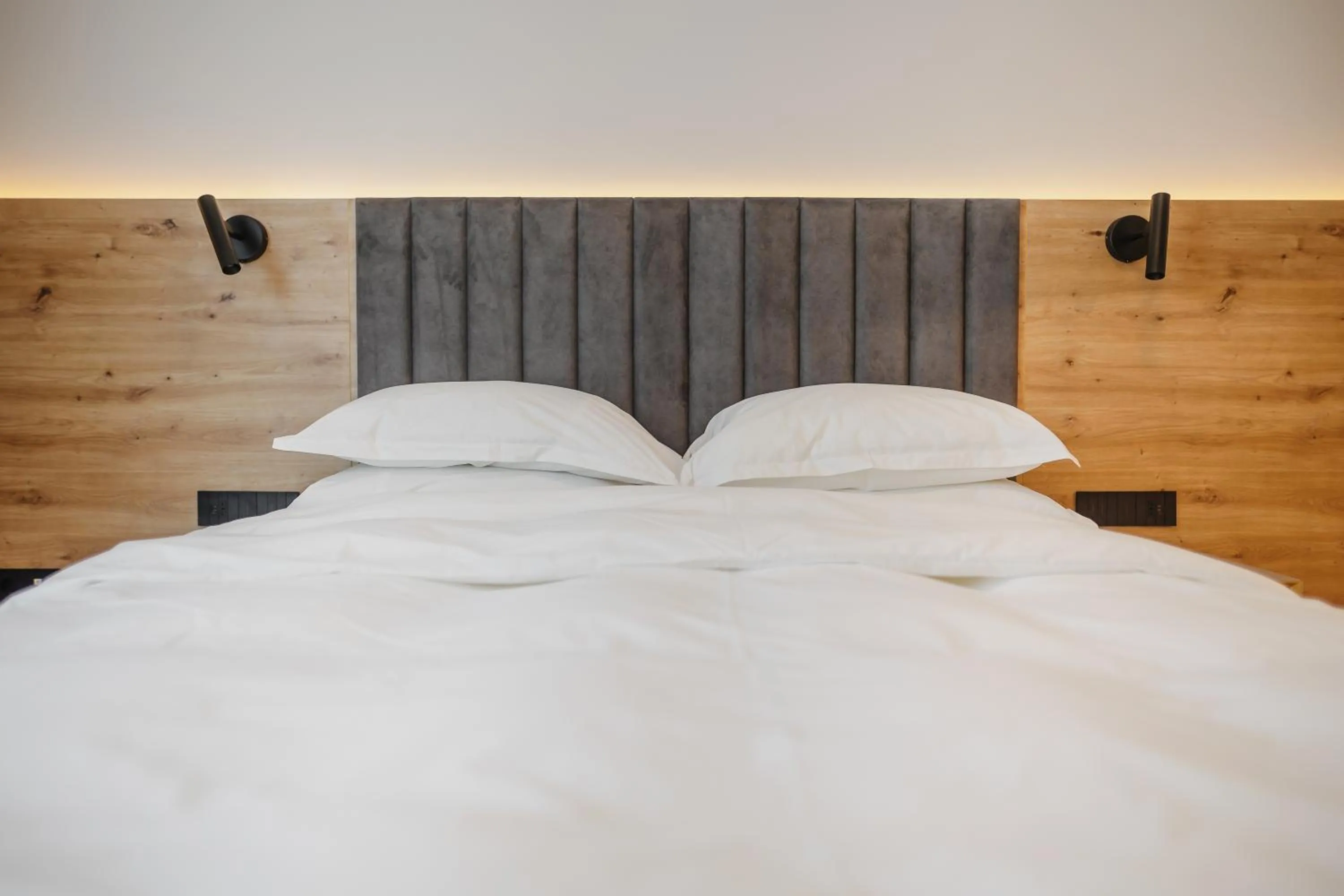 Bed in Bloom Downtown Suites