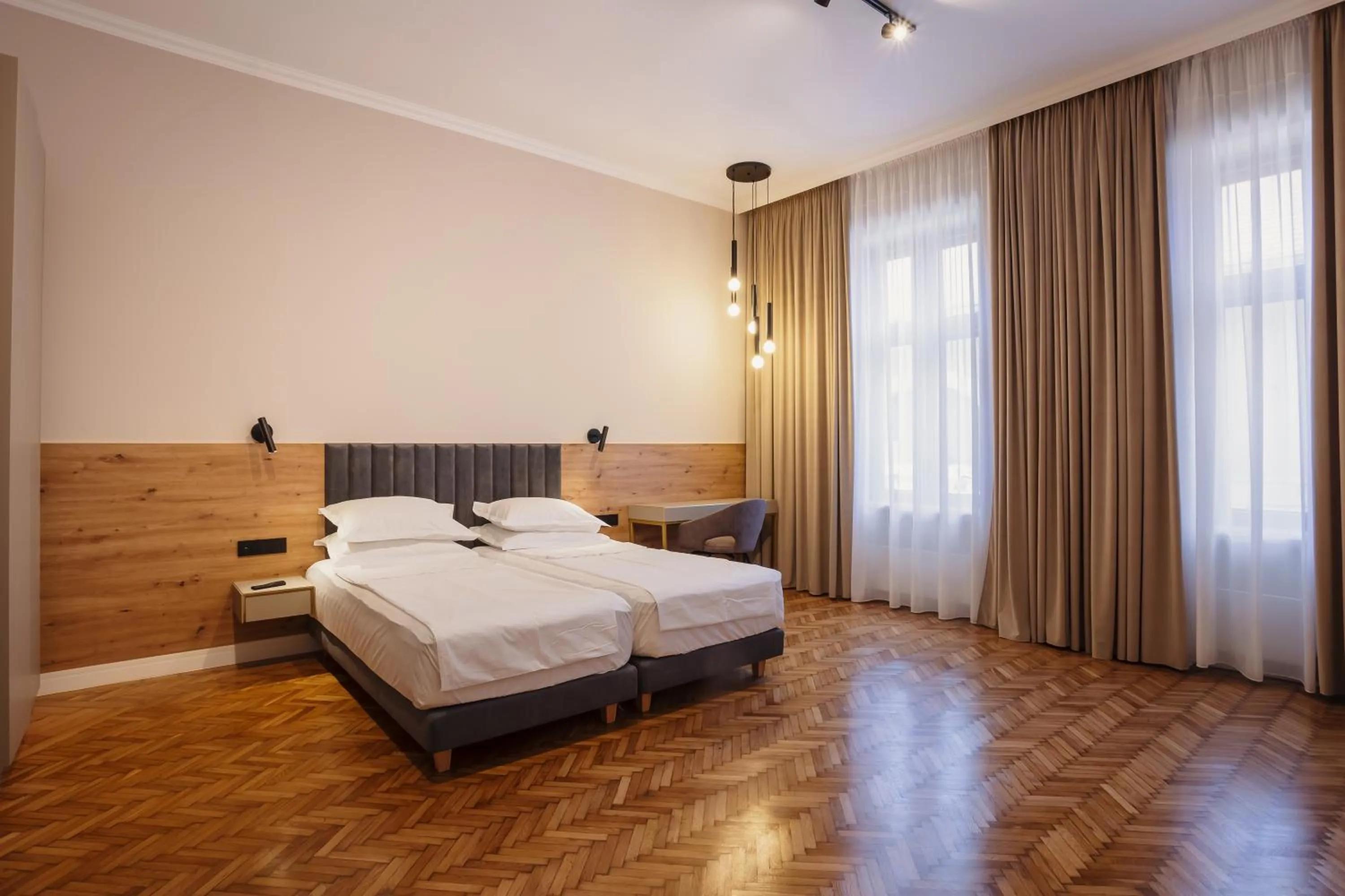 Bed in Bloom Downtown Suites