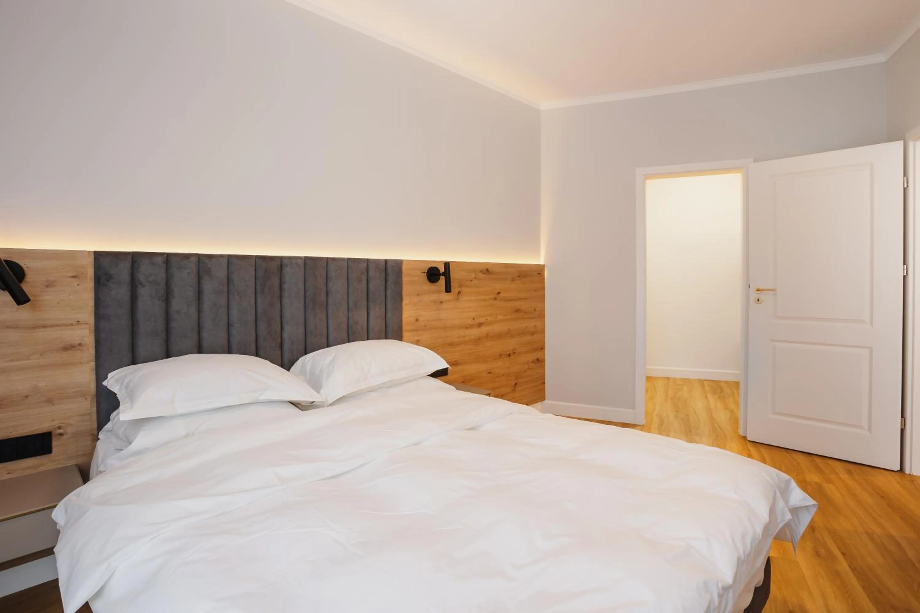 Bed in Bloom Downtown Suites