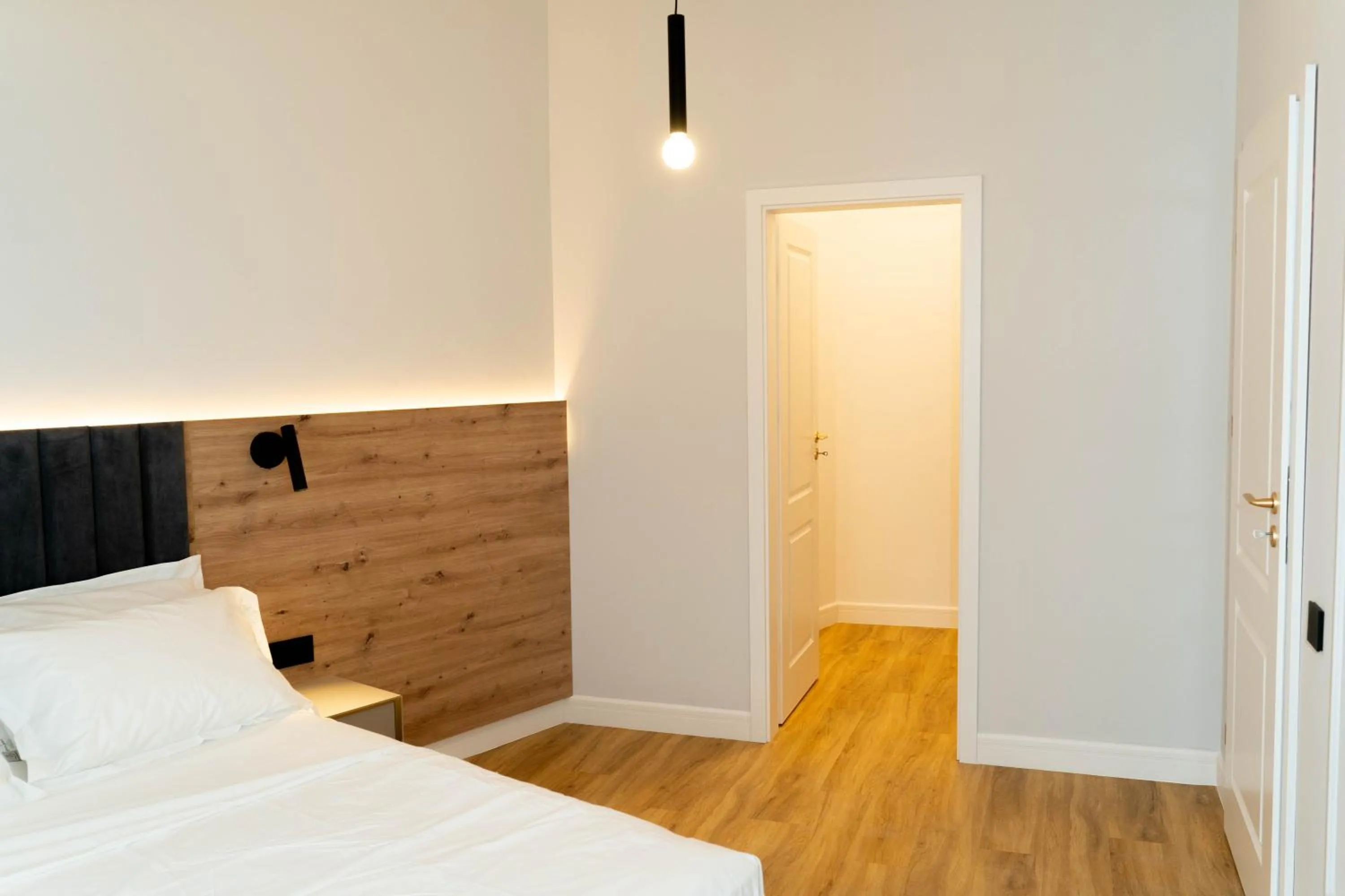 Bed in Bloom Downtown Suites