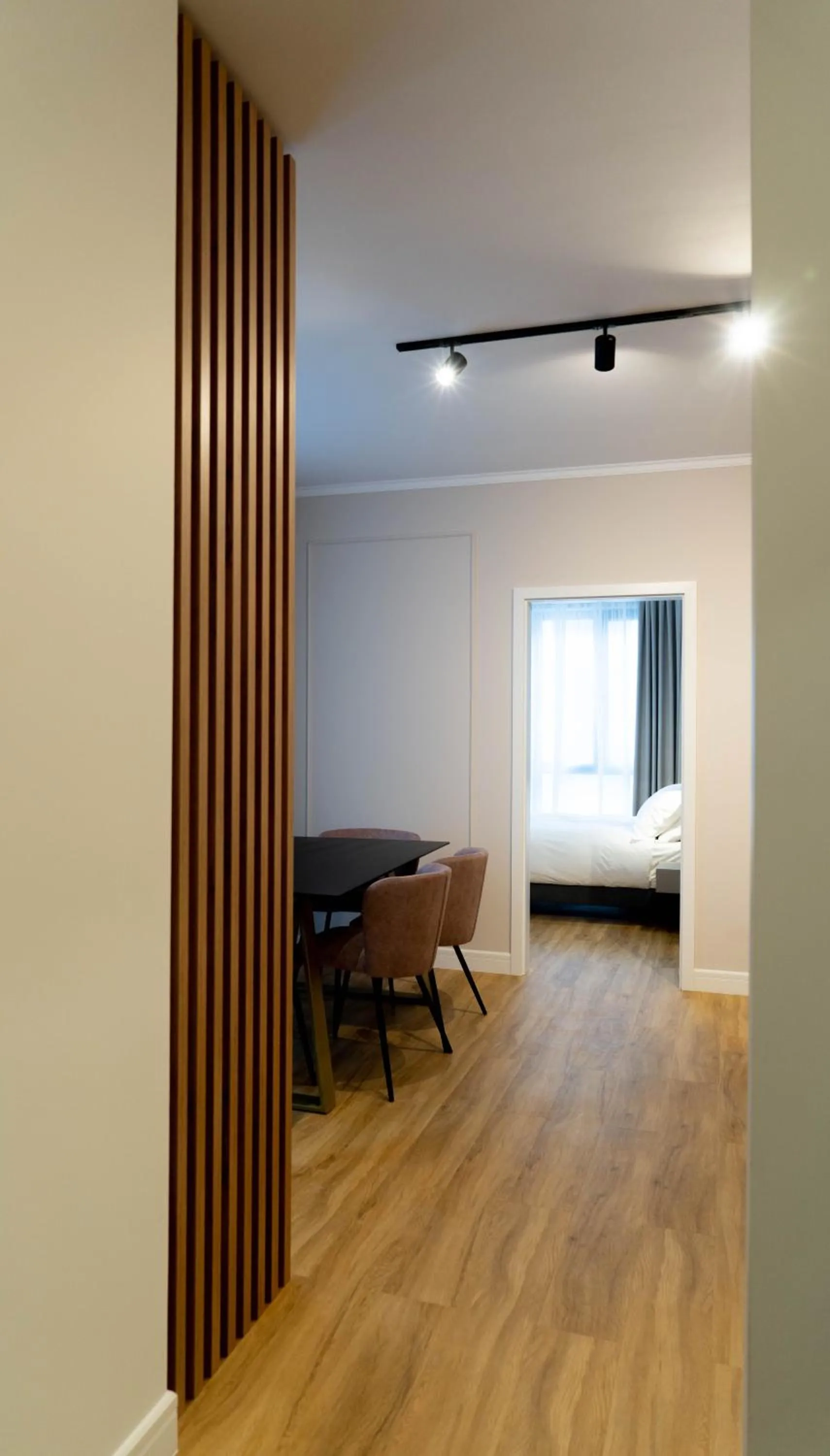 Living room, Bed in Bloom Downtown Suites