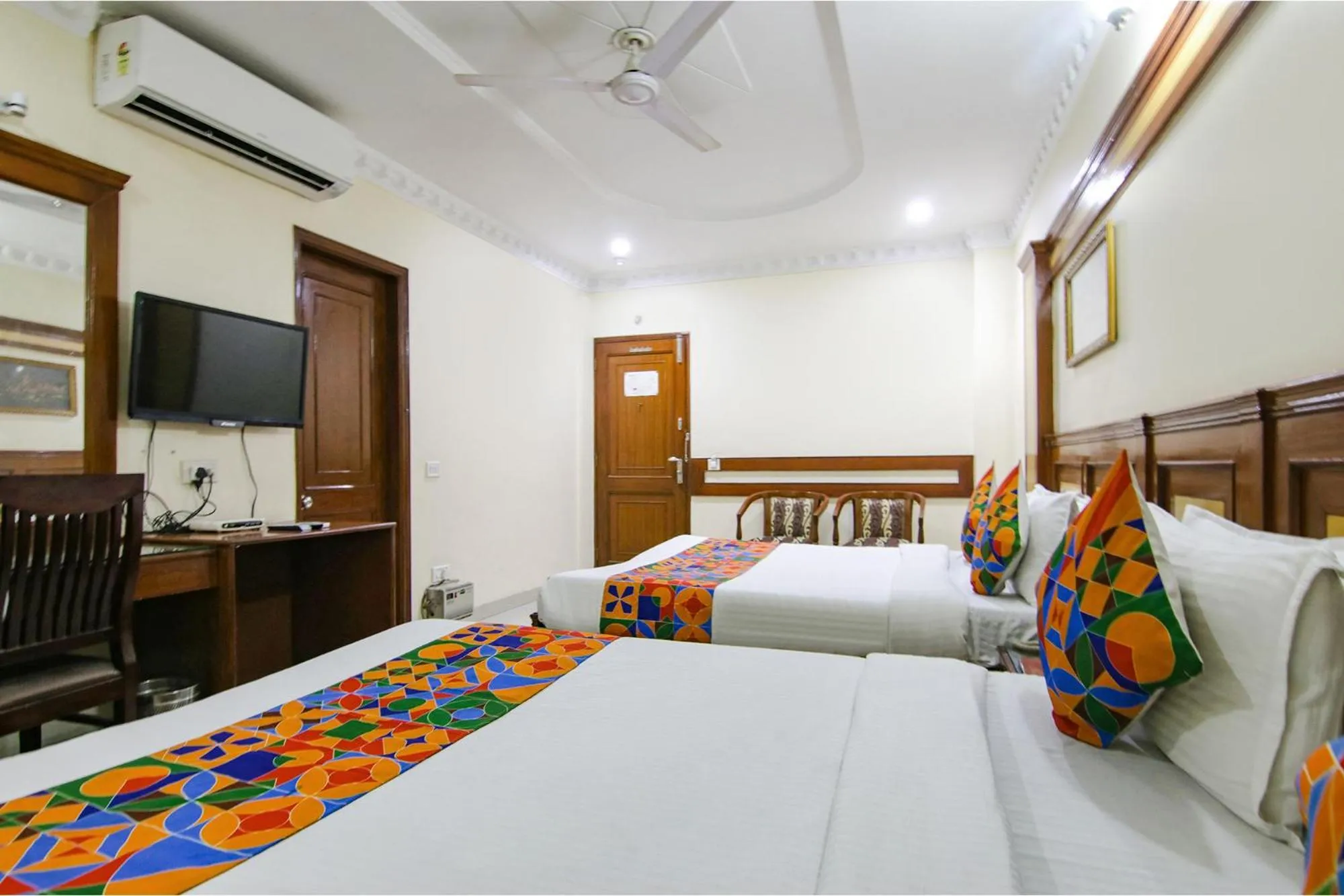 Bed in FabHotel CS Jalandhar