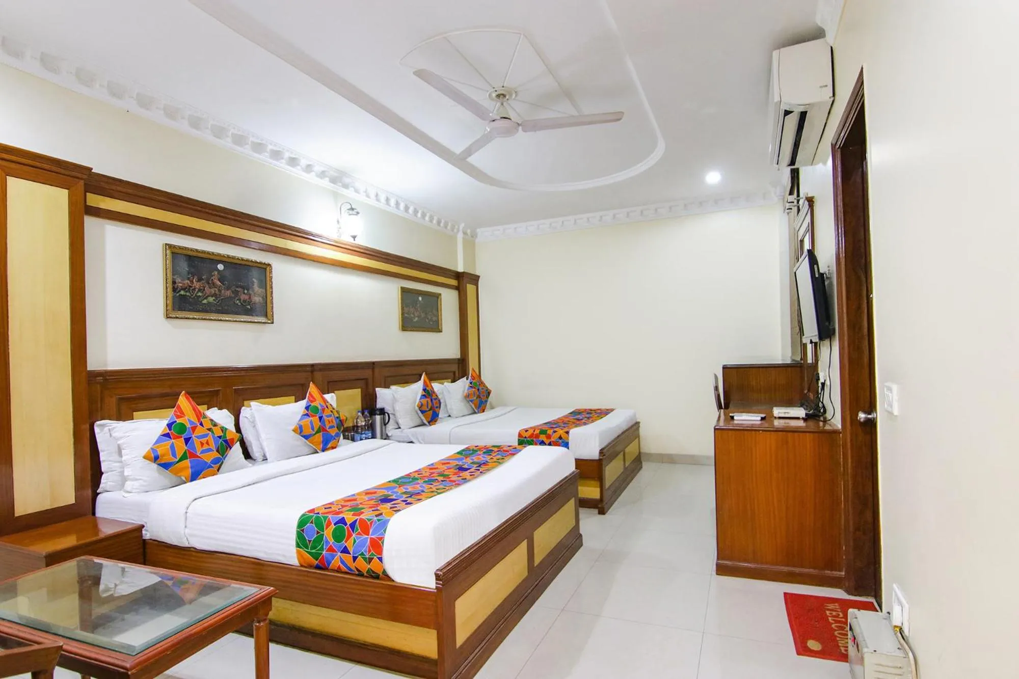 Bed in FabHotel CS Jalandhar