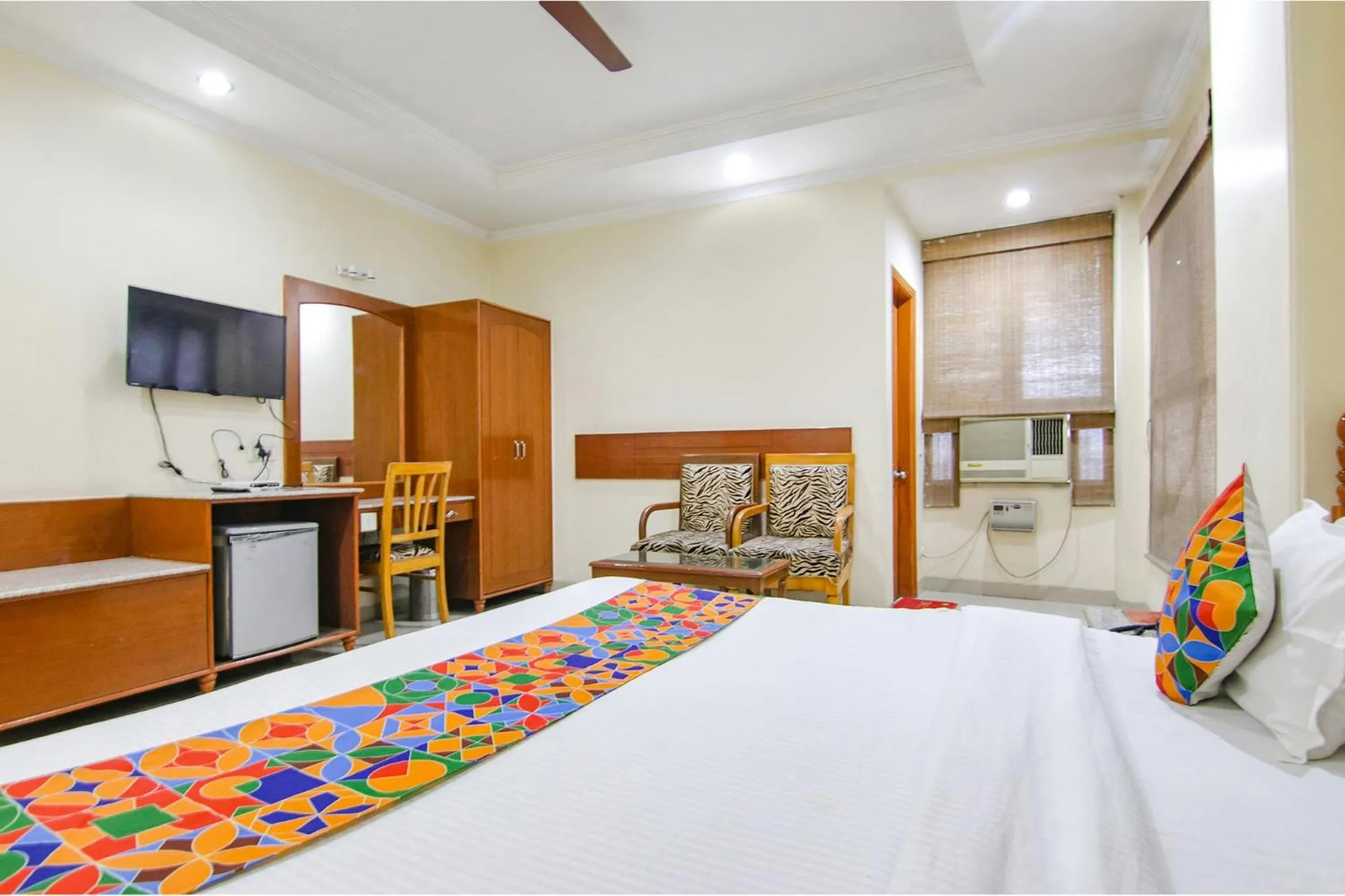 Bed in FabHotel CS Jalandhar