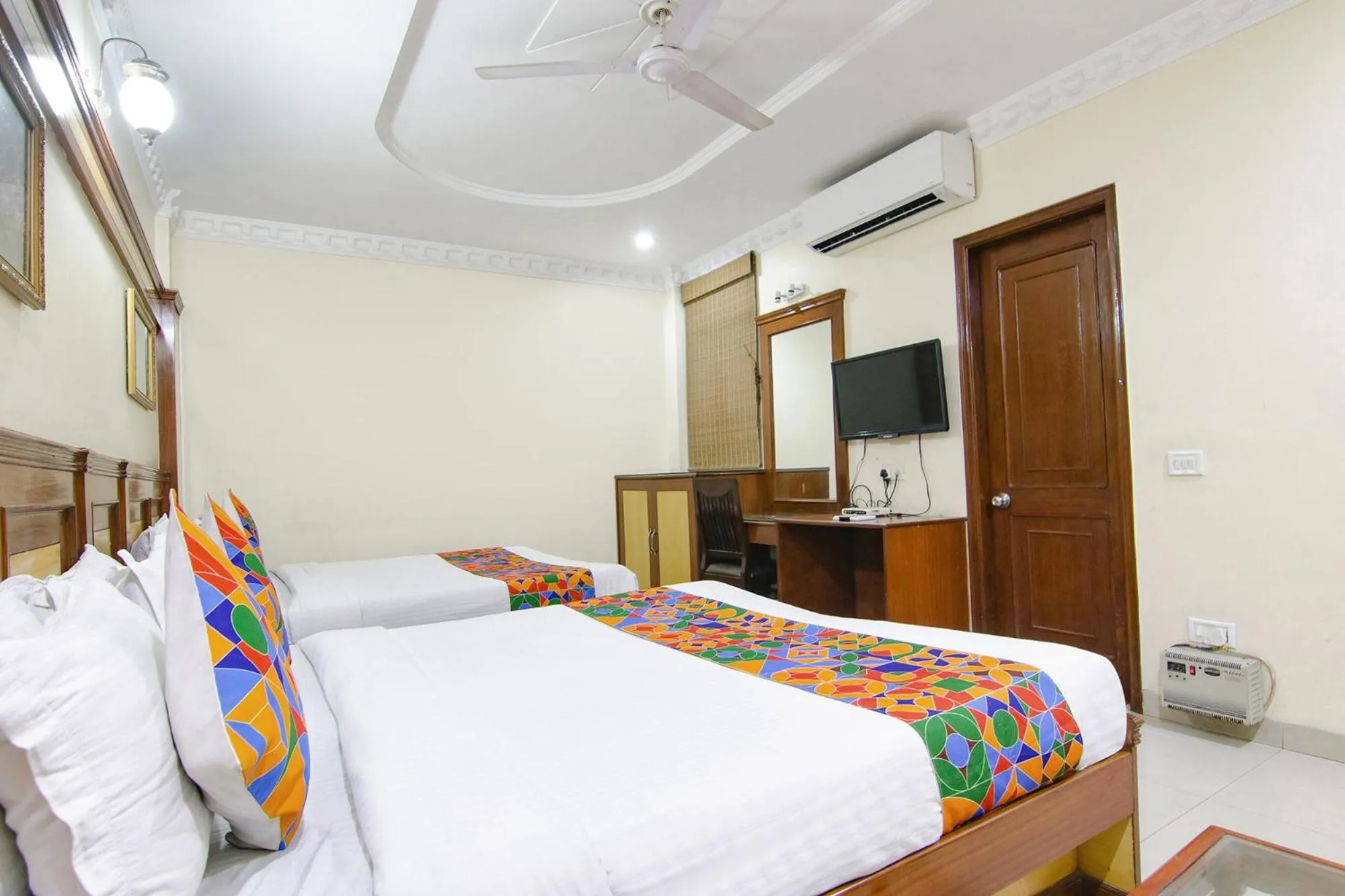 Bed in FabHotel CS Jalandhar