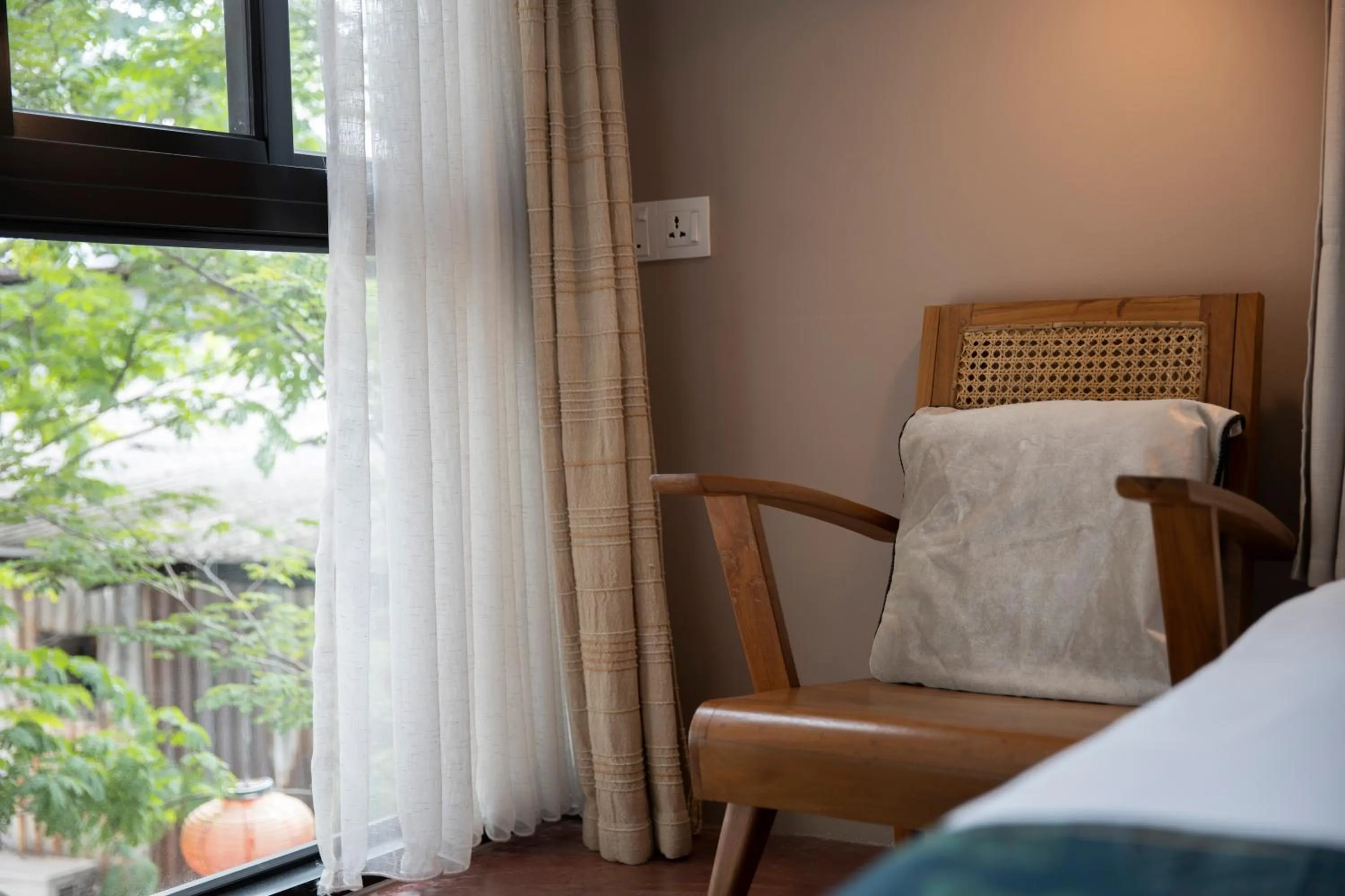 Seating area, Bed in Sweet Cili Boutique Hotel