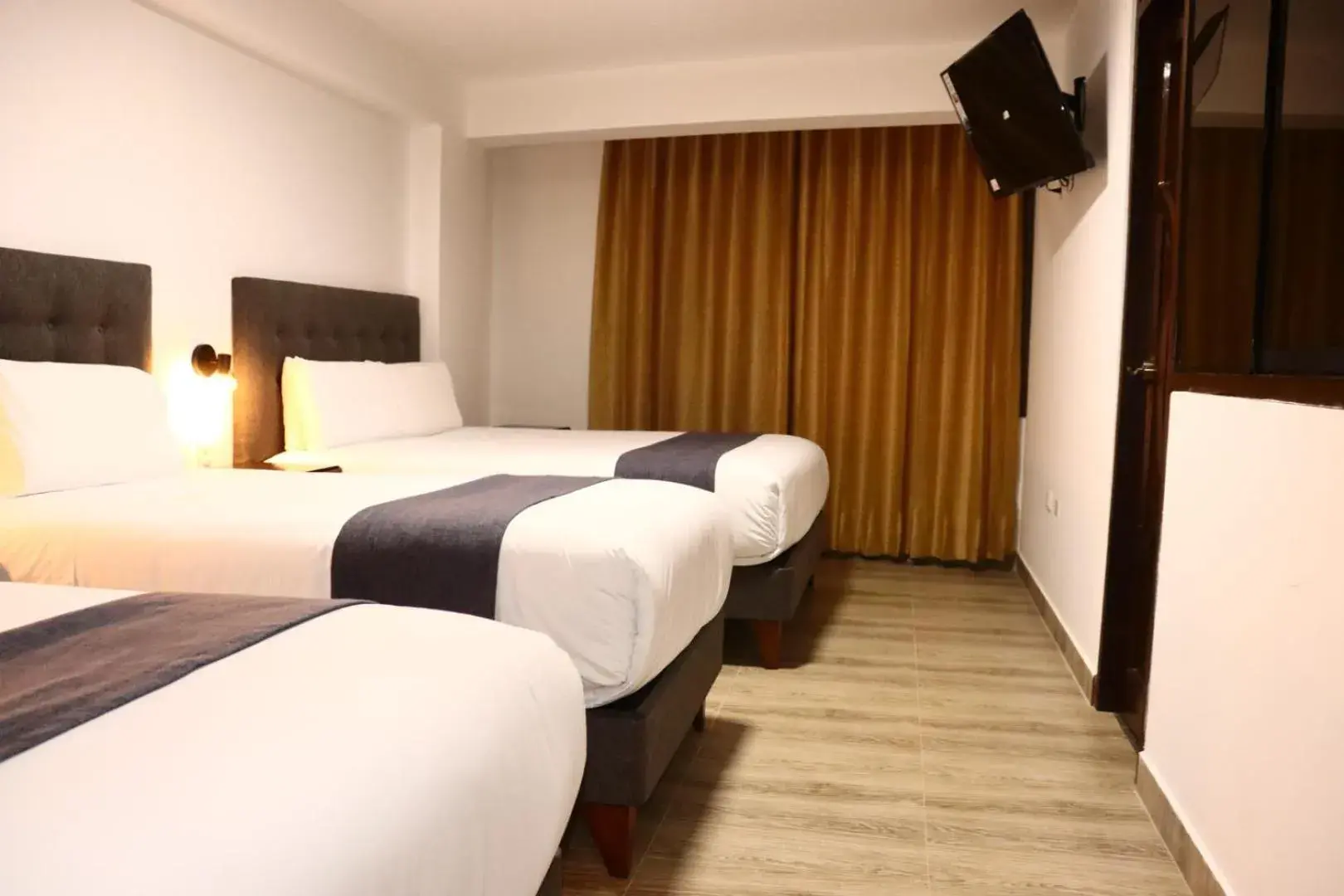 Triple Room in Tikal Inn Machupicchu Triple Room in Tikal Inn Machupicchu