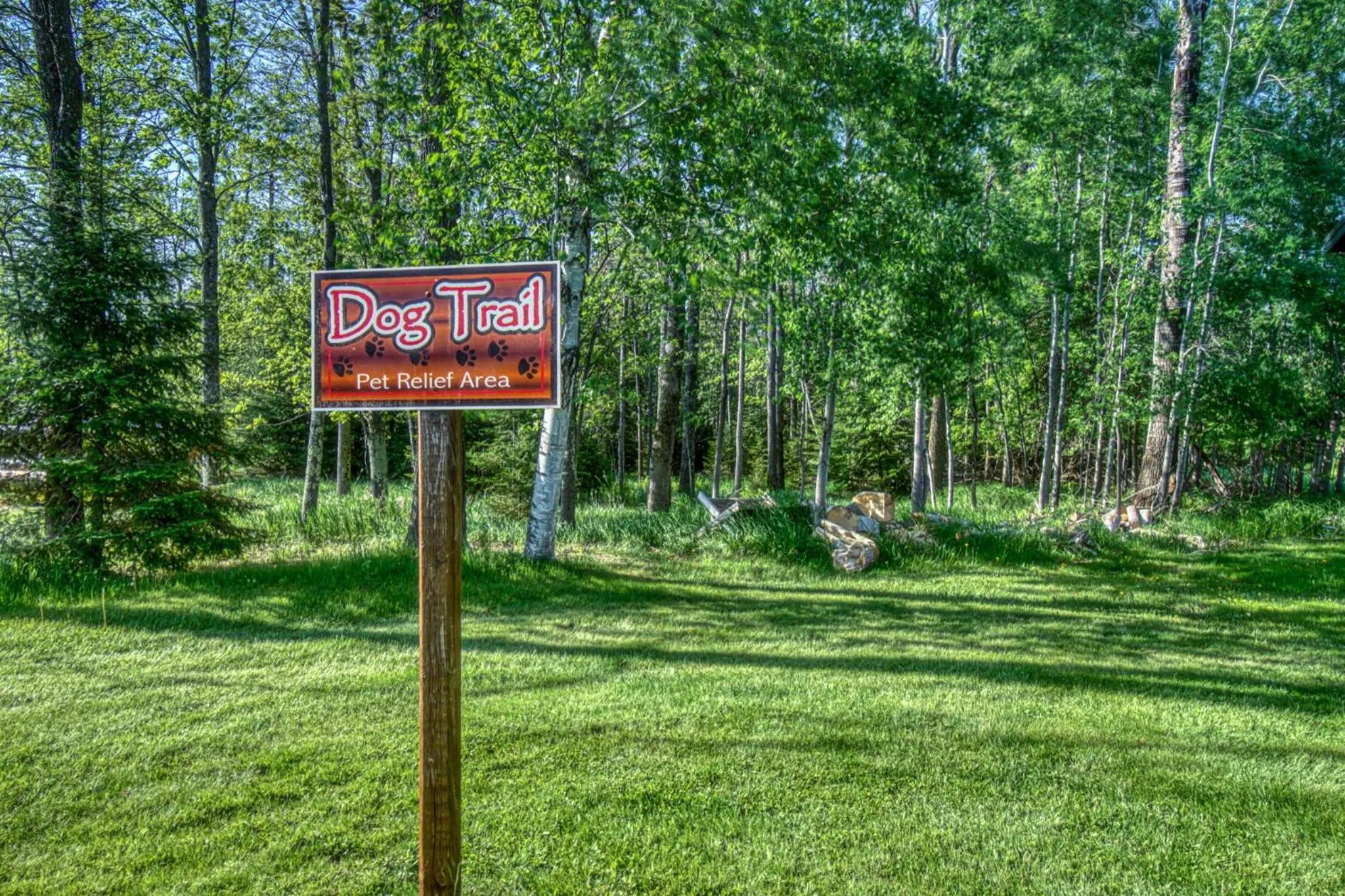Property logo or sign in Lena's Northern Pines Resort