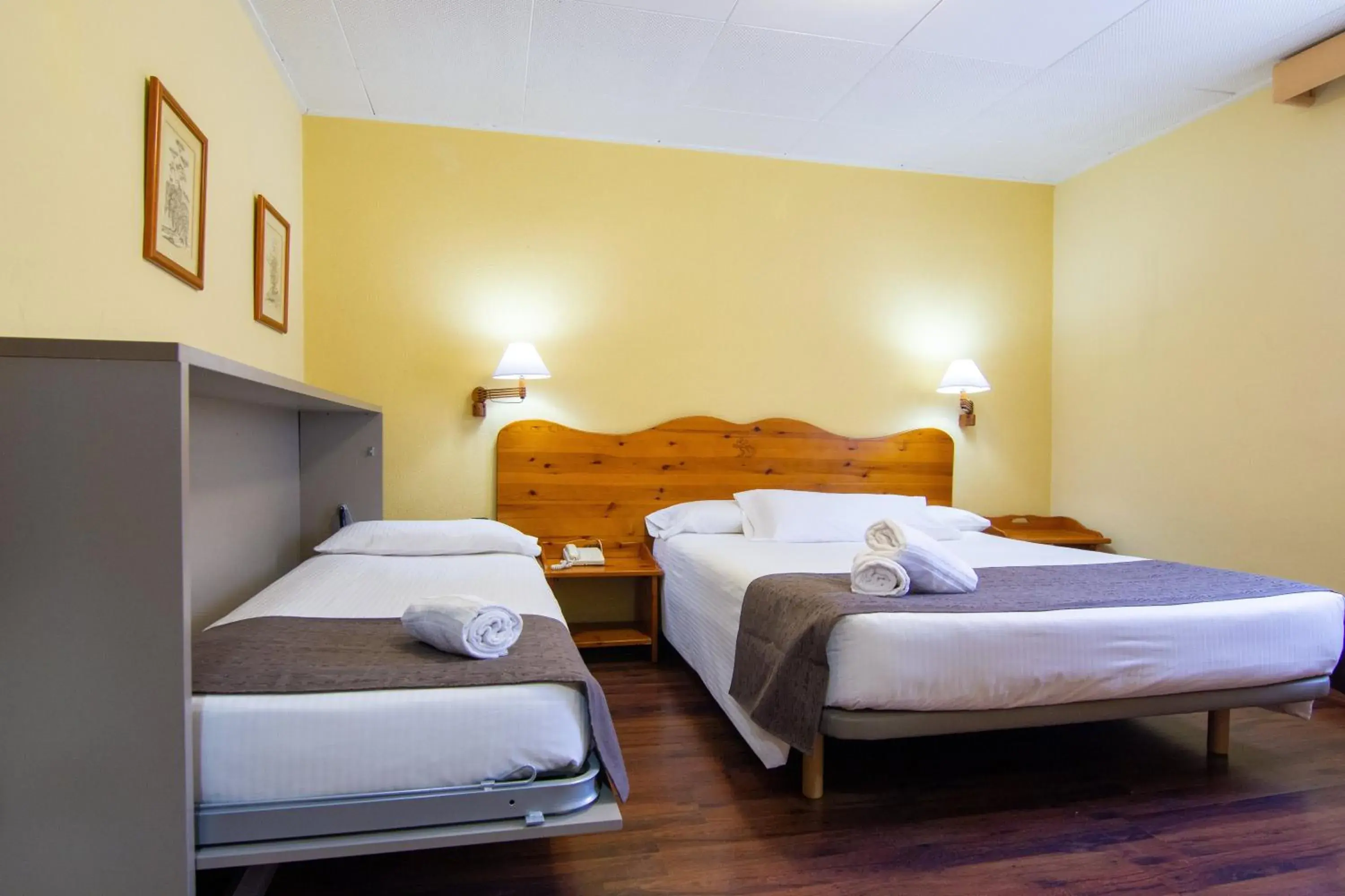 Triple Room (2 Adults + 1 Child) in Hotel Vall de Núria Triple Room (2 Adults + 1 Child) in Hotel Vall de Núria