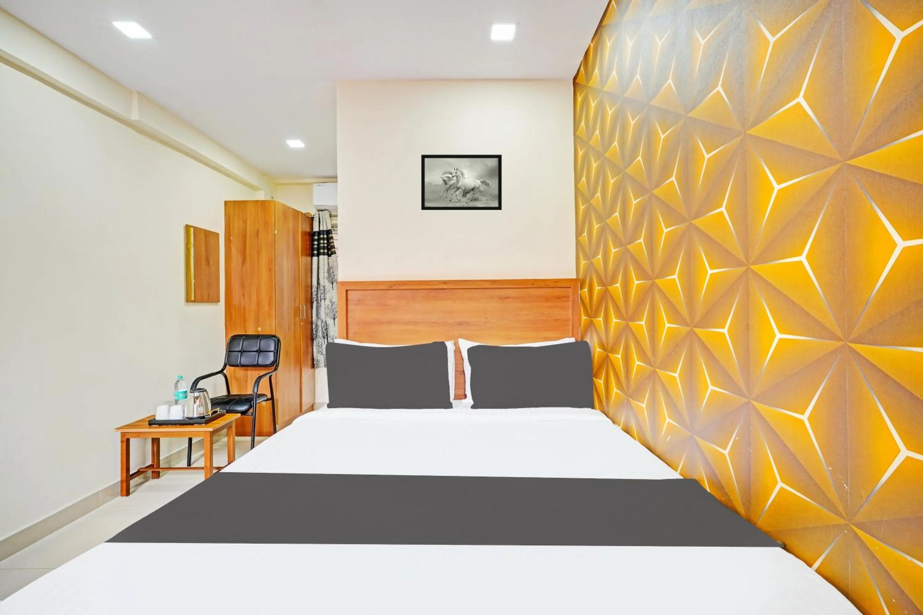 Bedroom in Hotel O Chalukya Comfort