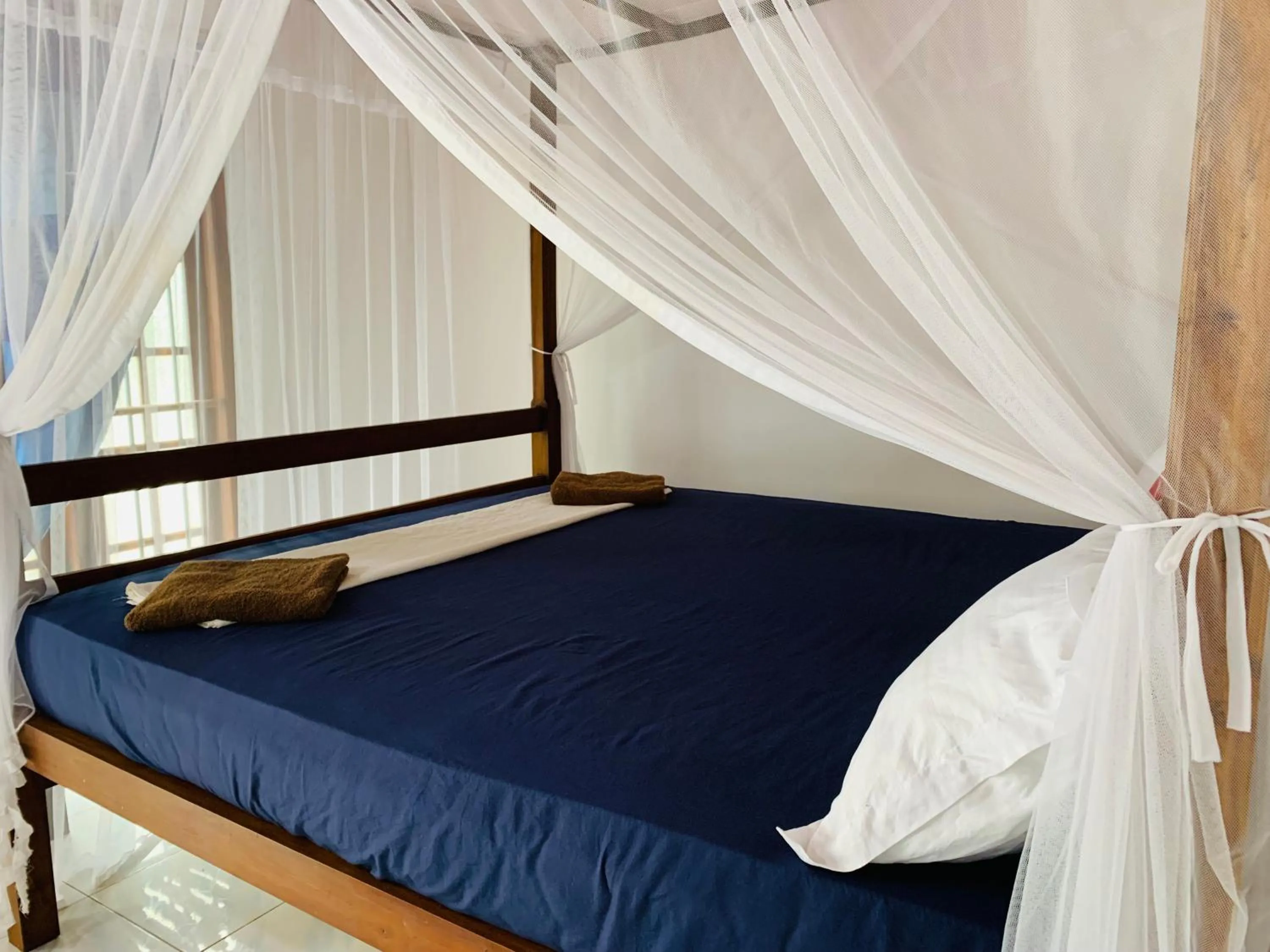 Photo of the whole room, Bed in Calidan