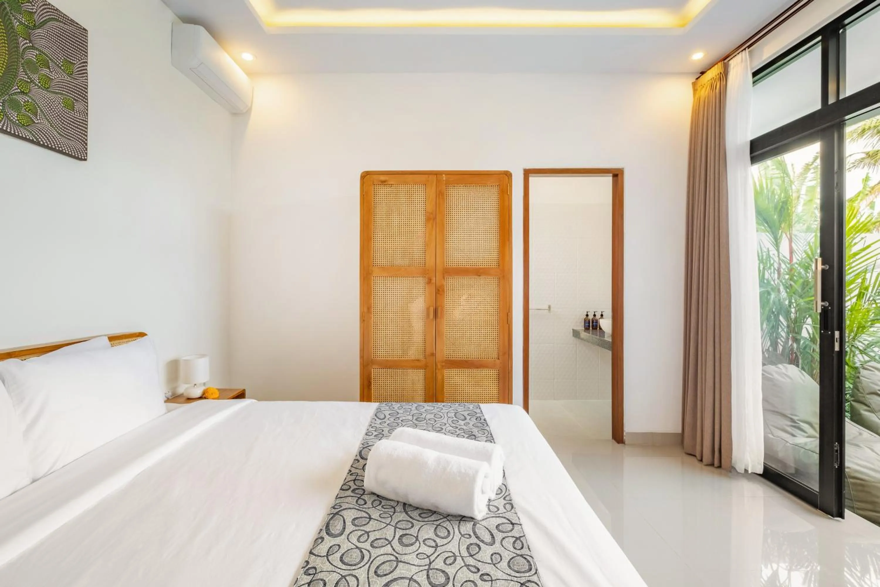 Bedroom, Bed in The Lavana Bliss One Villa Nyanyi Beach