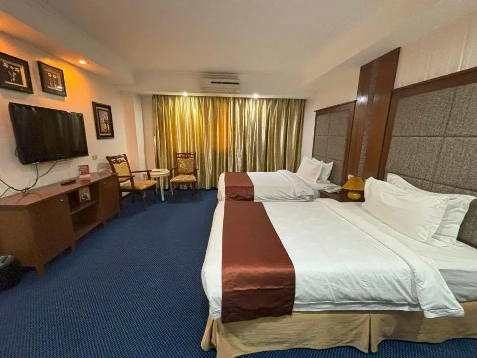 Bed in Lido De Paris Hotel