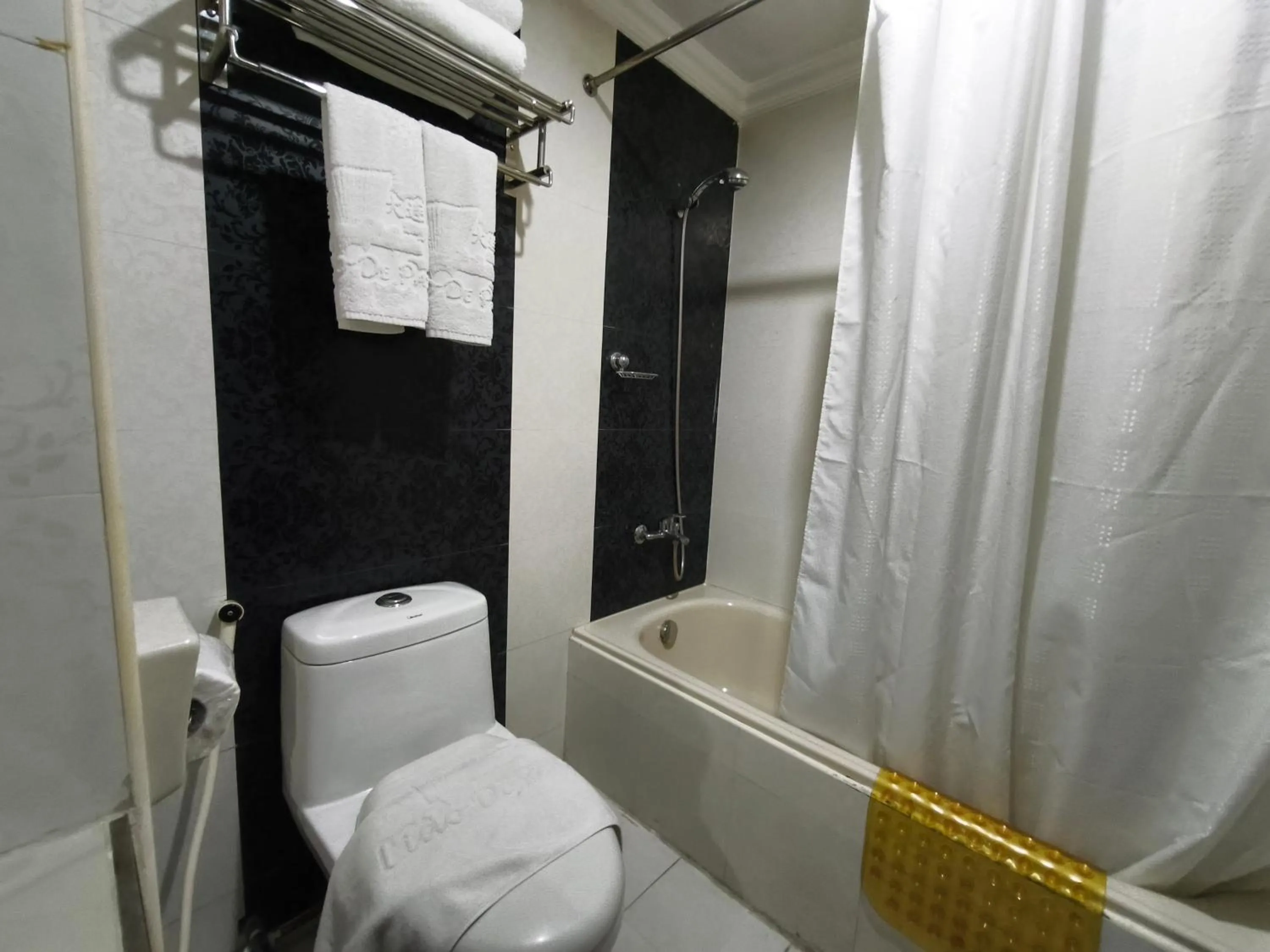 Toilet in Lido De Paris Hotel