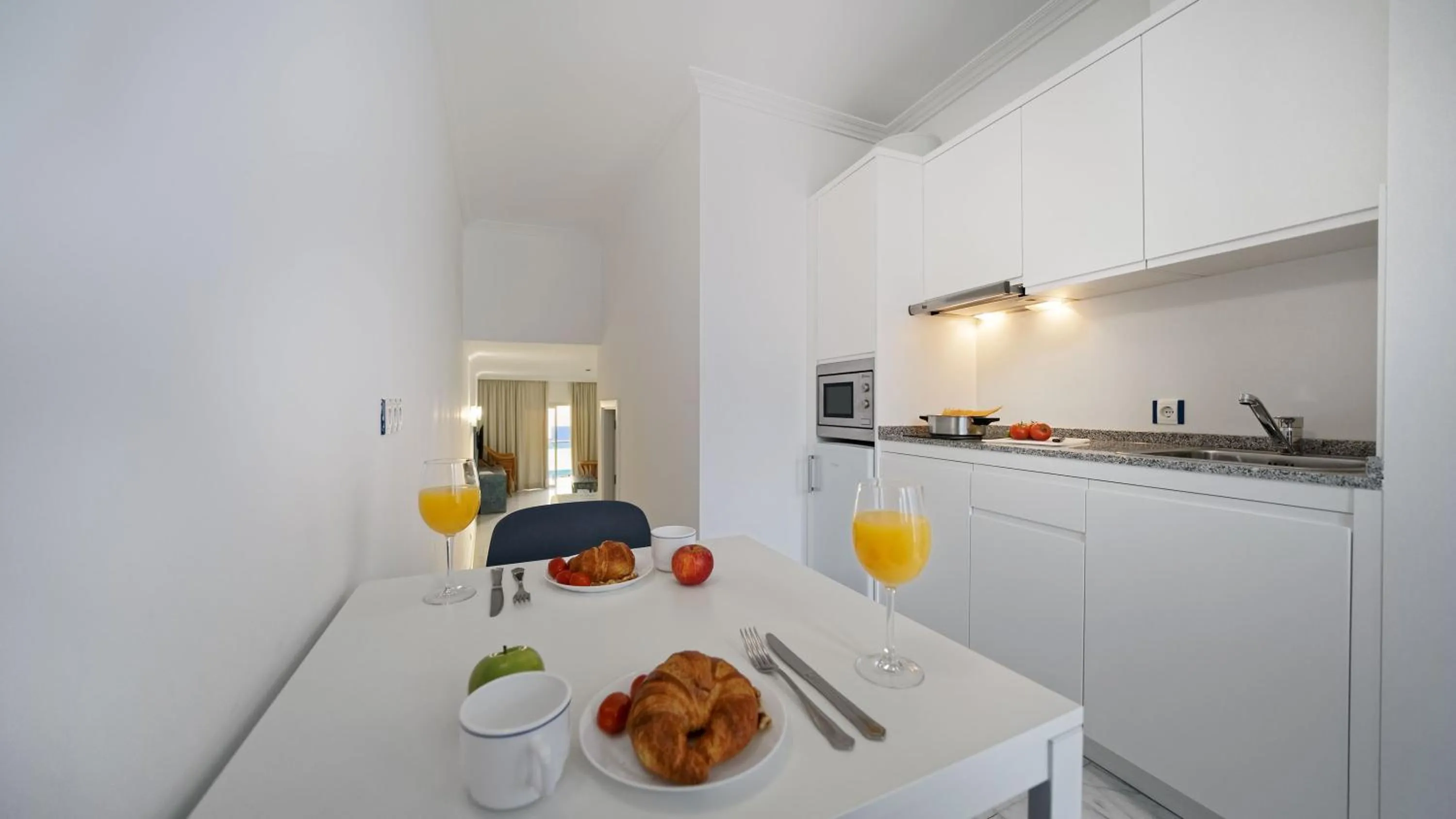 Kitchen or kitchenette in Apartamentos Igramar MorroJable - Adults Only