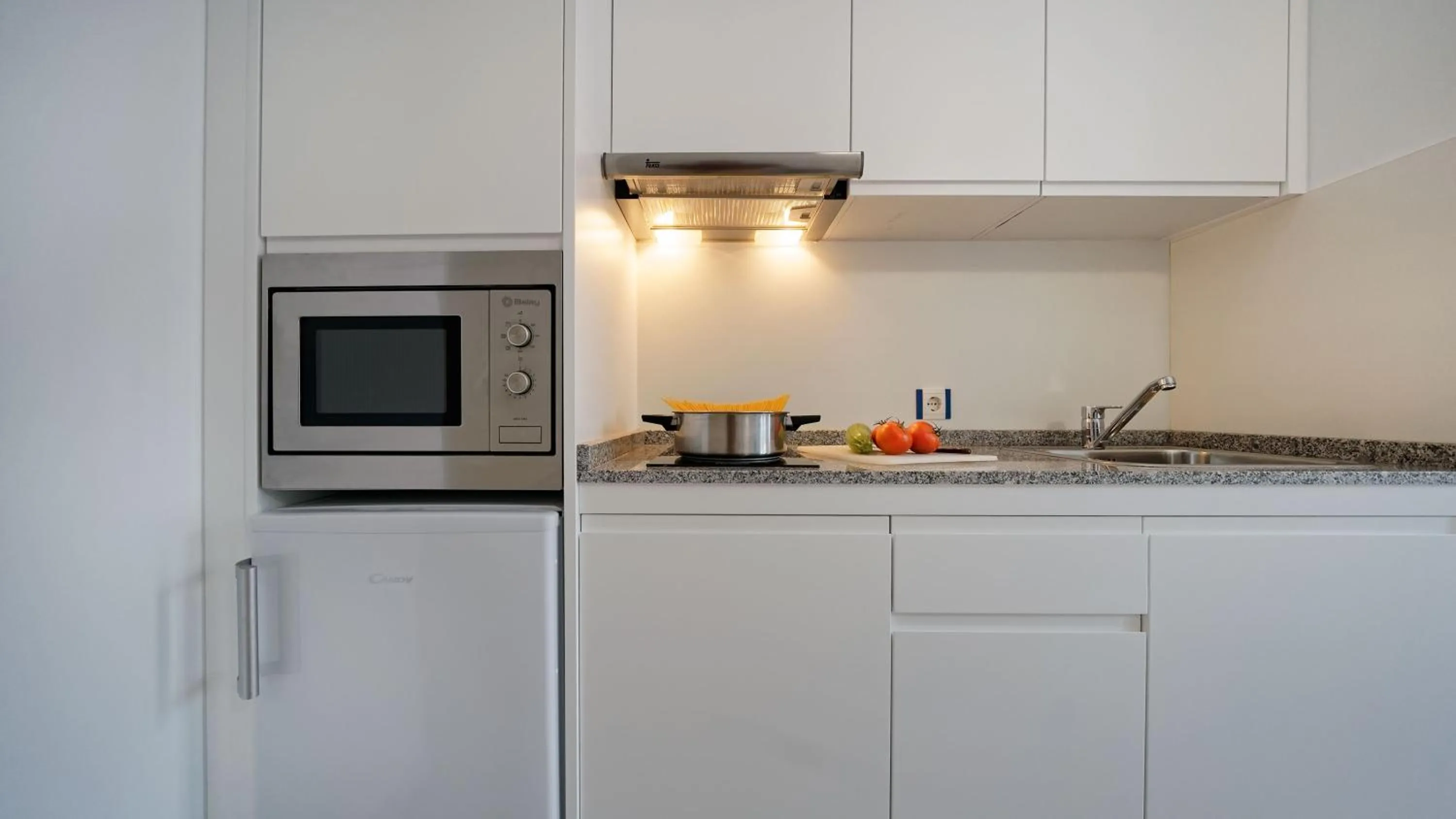Kitchen or kitchenette in Apartamentos Igramar MorroJable - Adults Only
