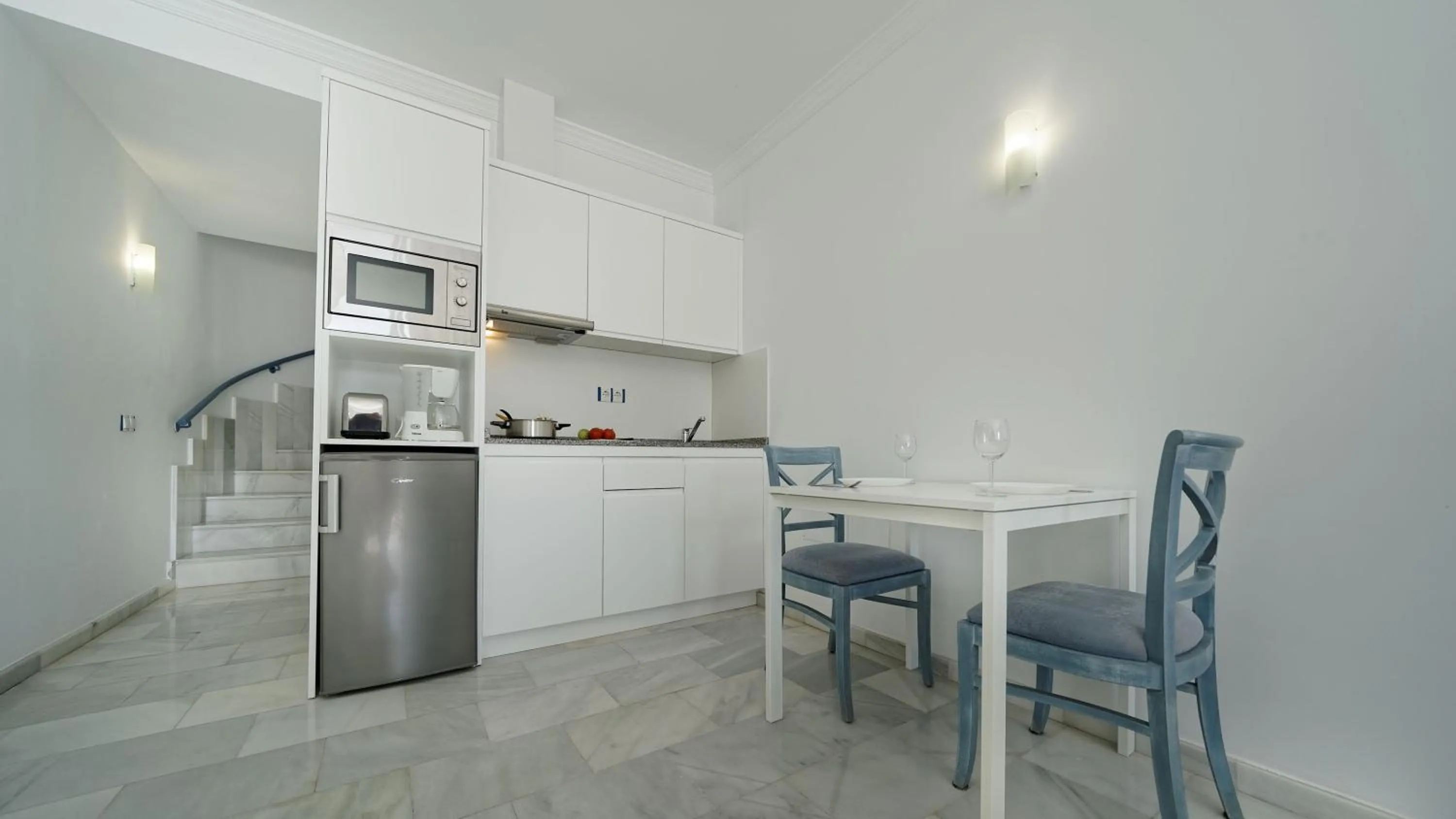 Kitchen or kitchenette in Apartamentos Igramar MorroJable - Adults Only