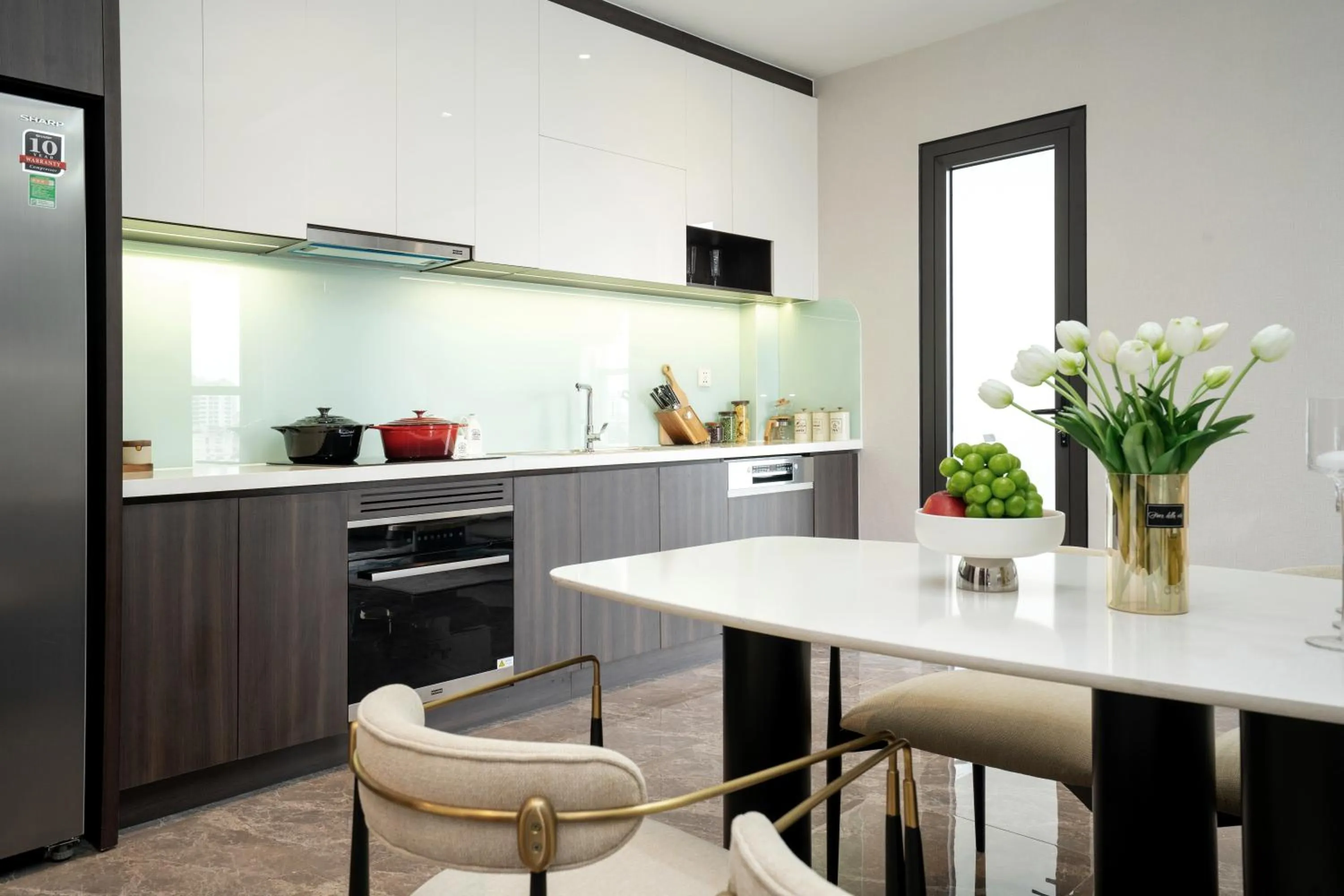 kitchen in The Gloria Serviced Apartment by Silk Path