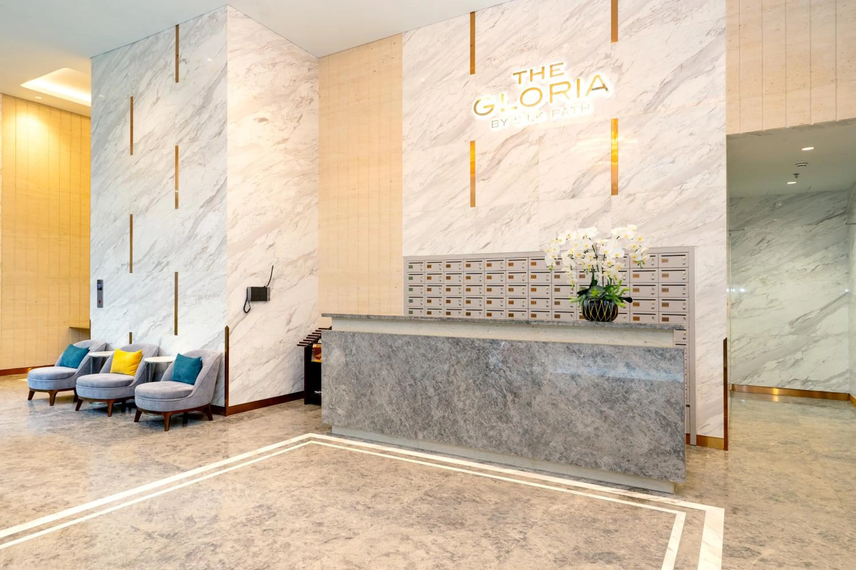Lobby or reception in The Gloria Serviced Apartment by Silk Path