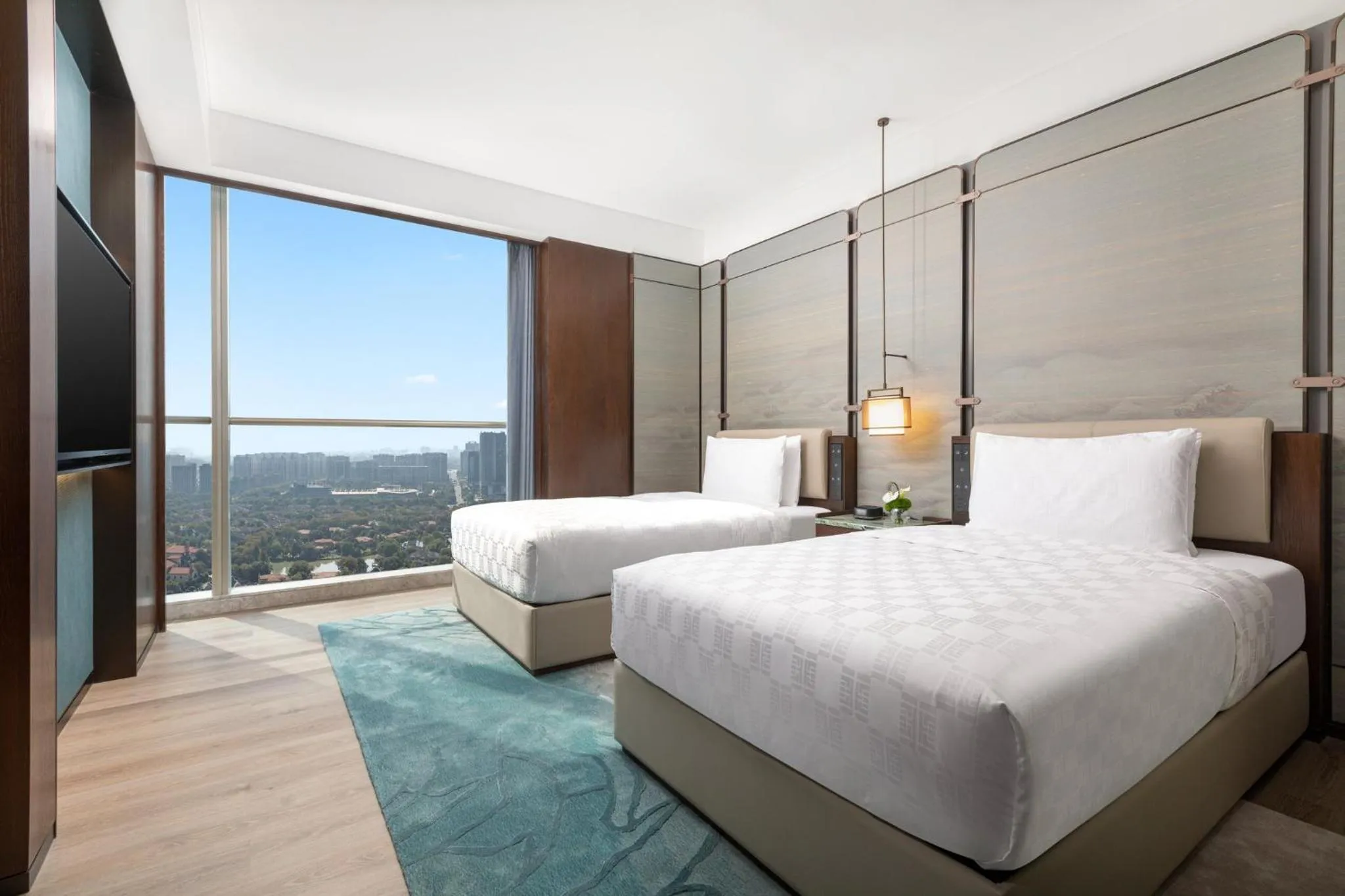 Photo of the whole room, Bed in HUALUXE Hotels and Resorts Haining