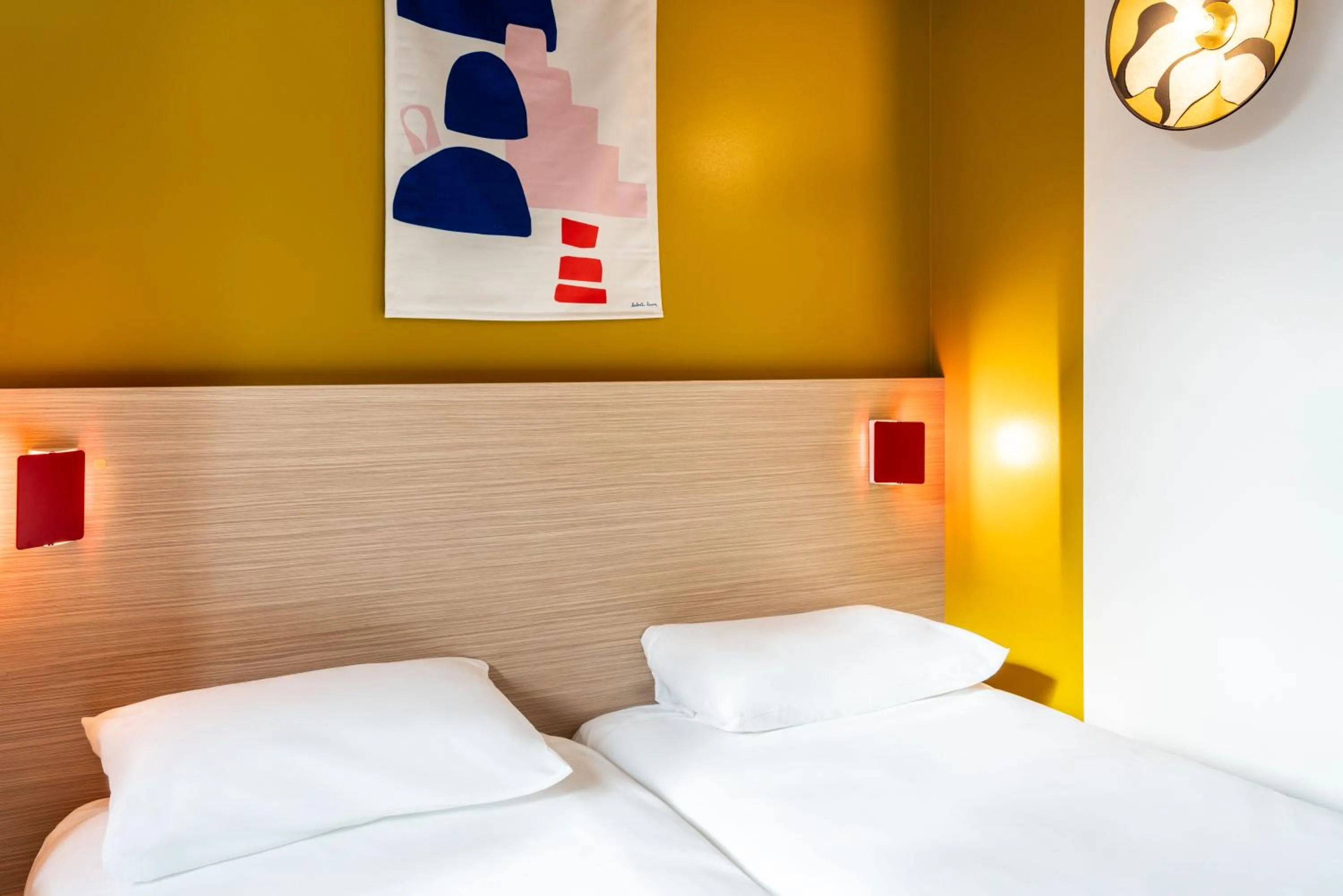 Bed in ibis Styles Prévessin Genève Aéroport