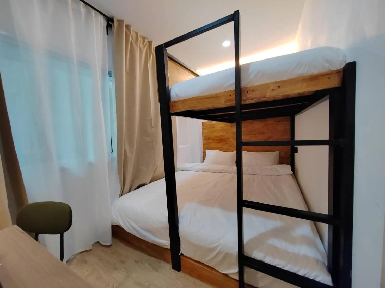 Photo of the whole room, Bed in The Motuga Hostel Bangkok