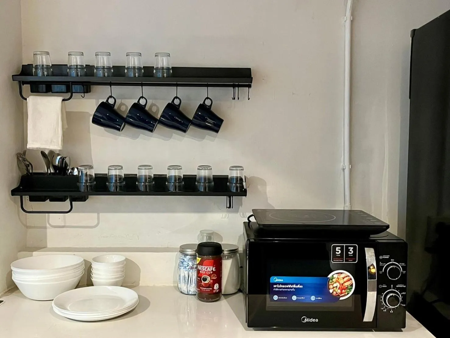 kitchen in The Motuga Hostel Bangkok