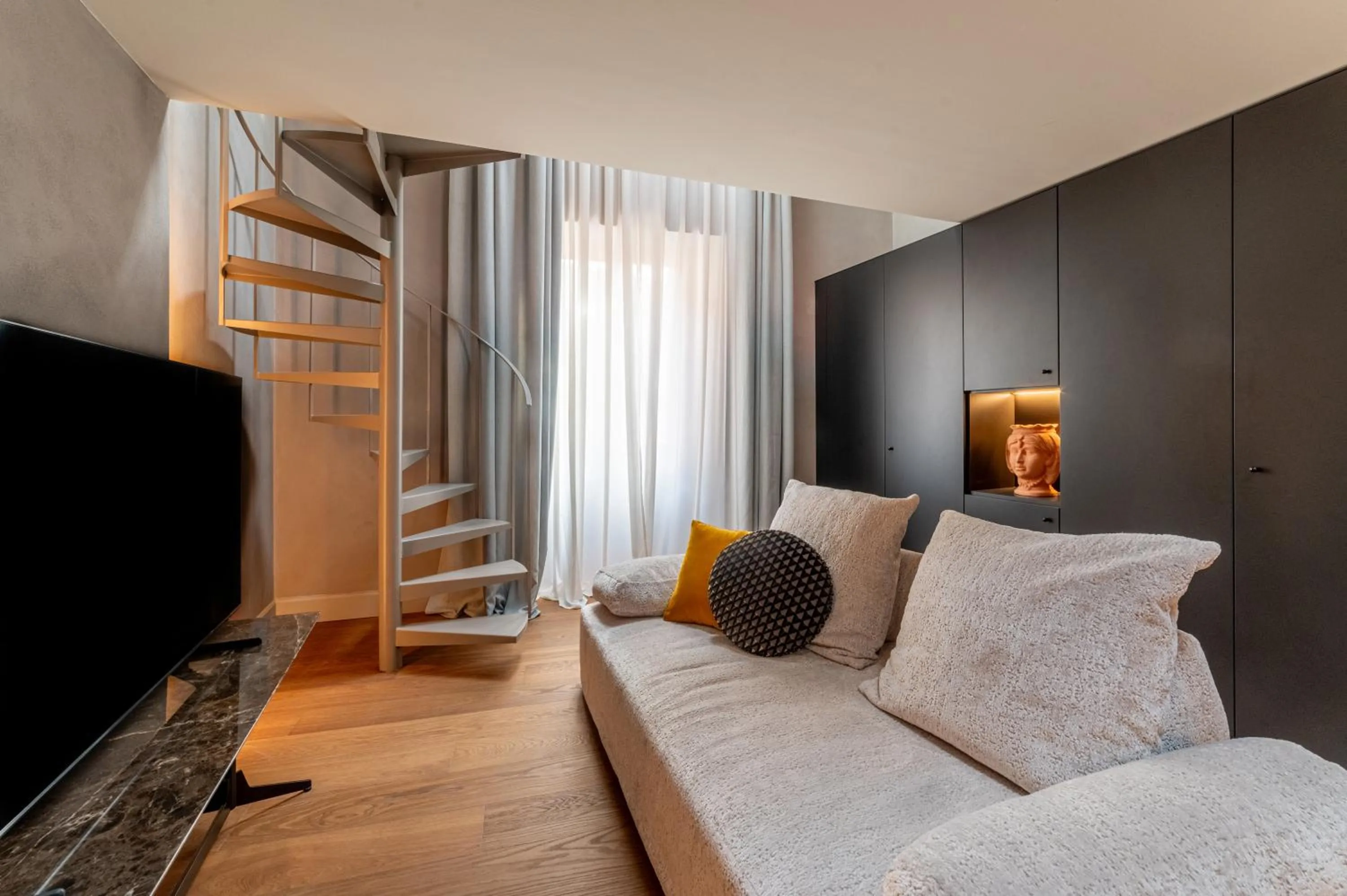 Communal lounge/ TV room in Villa Conrad