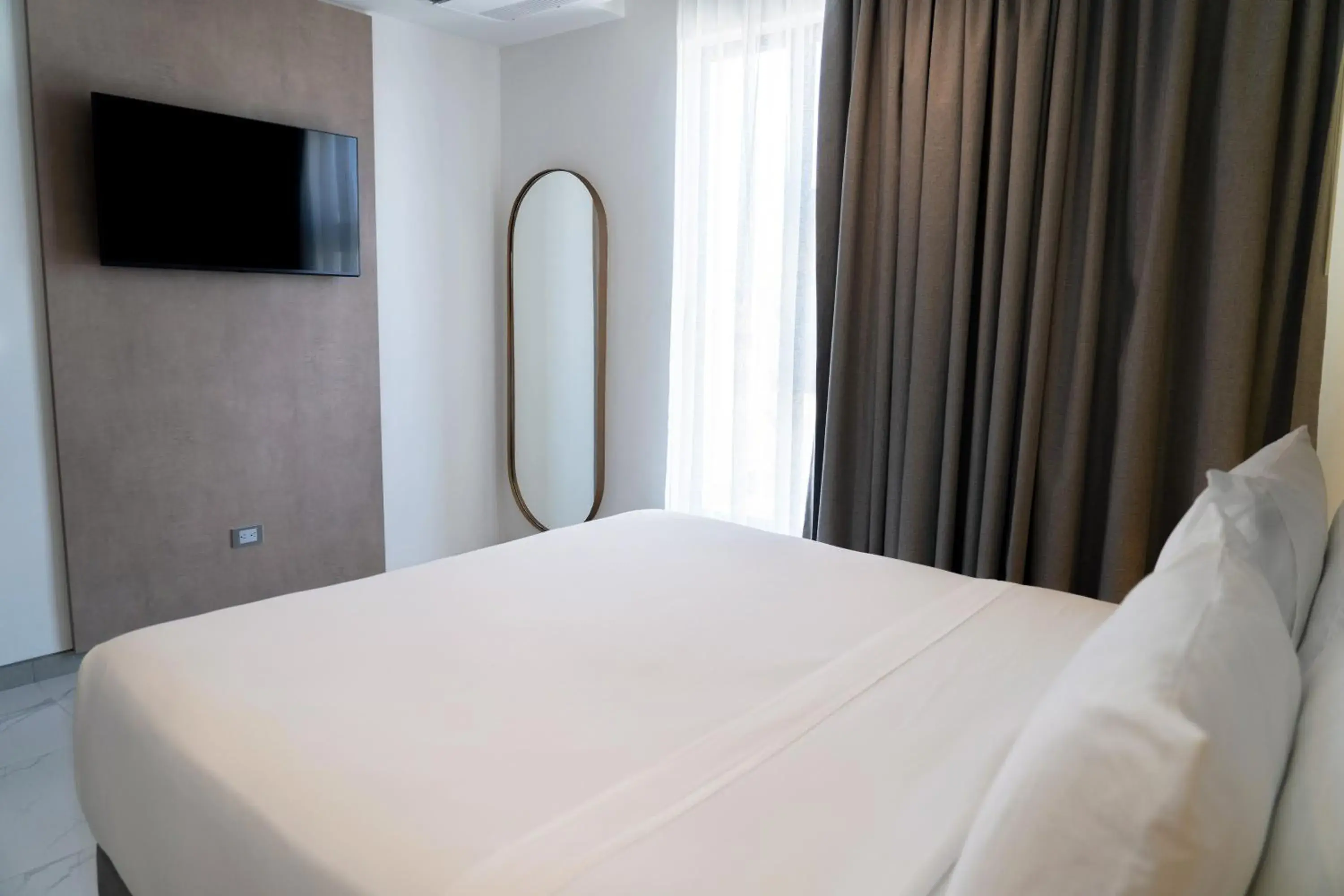 Bed in Delamar Hotel Bed in Delamar Hotel