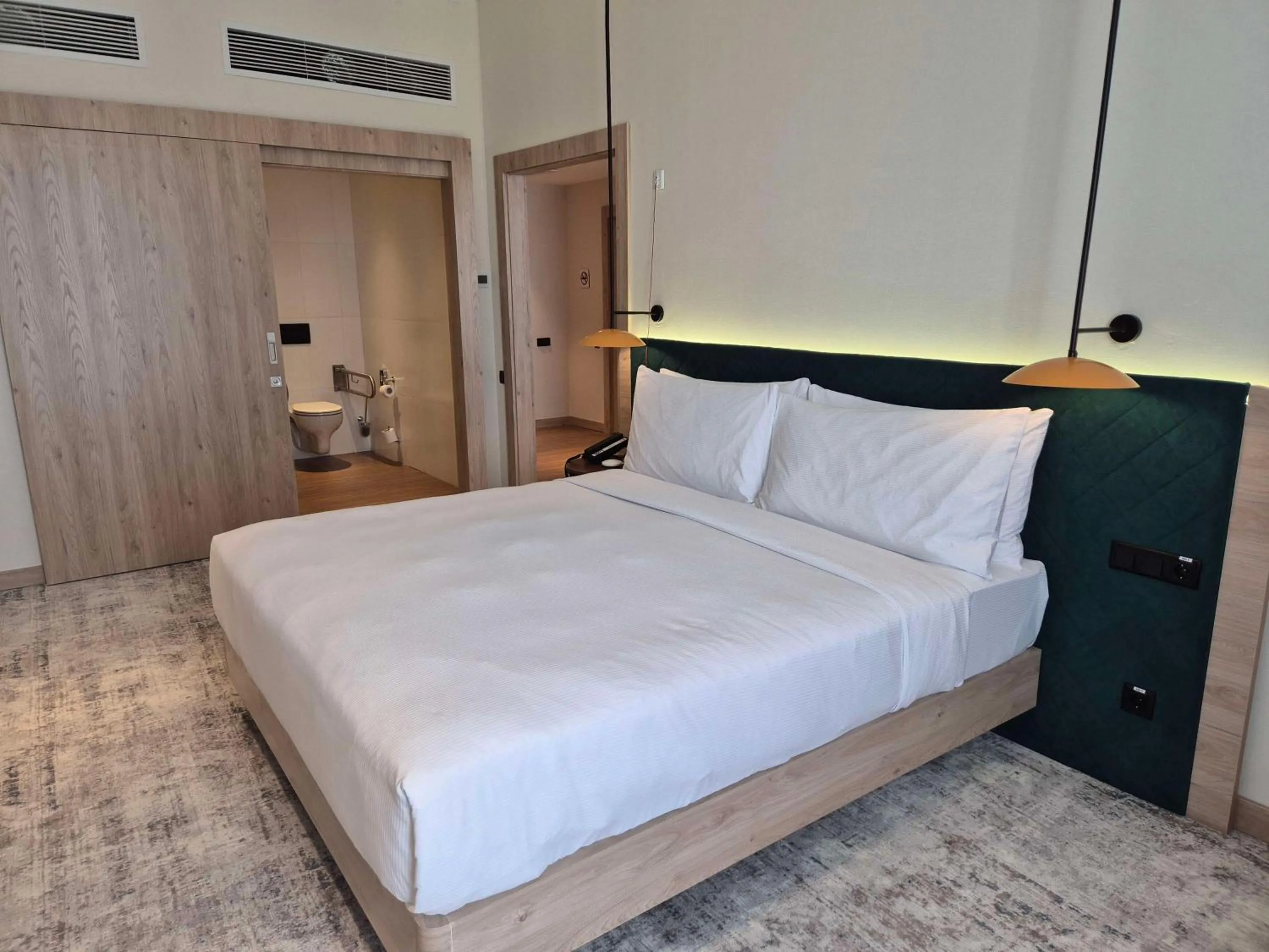 Bed in Hilton Garden Inn Termez Airitom