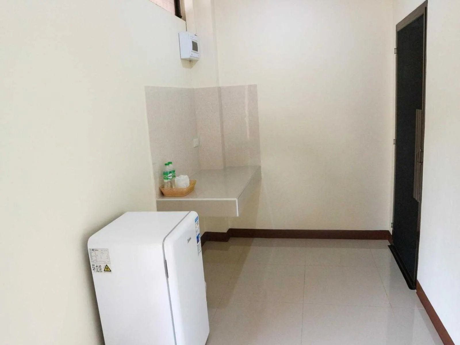 Bathroom in Capital O 75521 Sang Siri Apartment