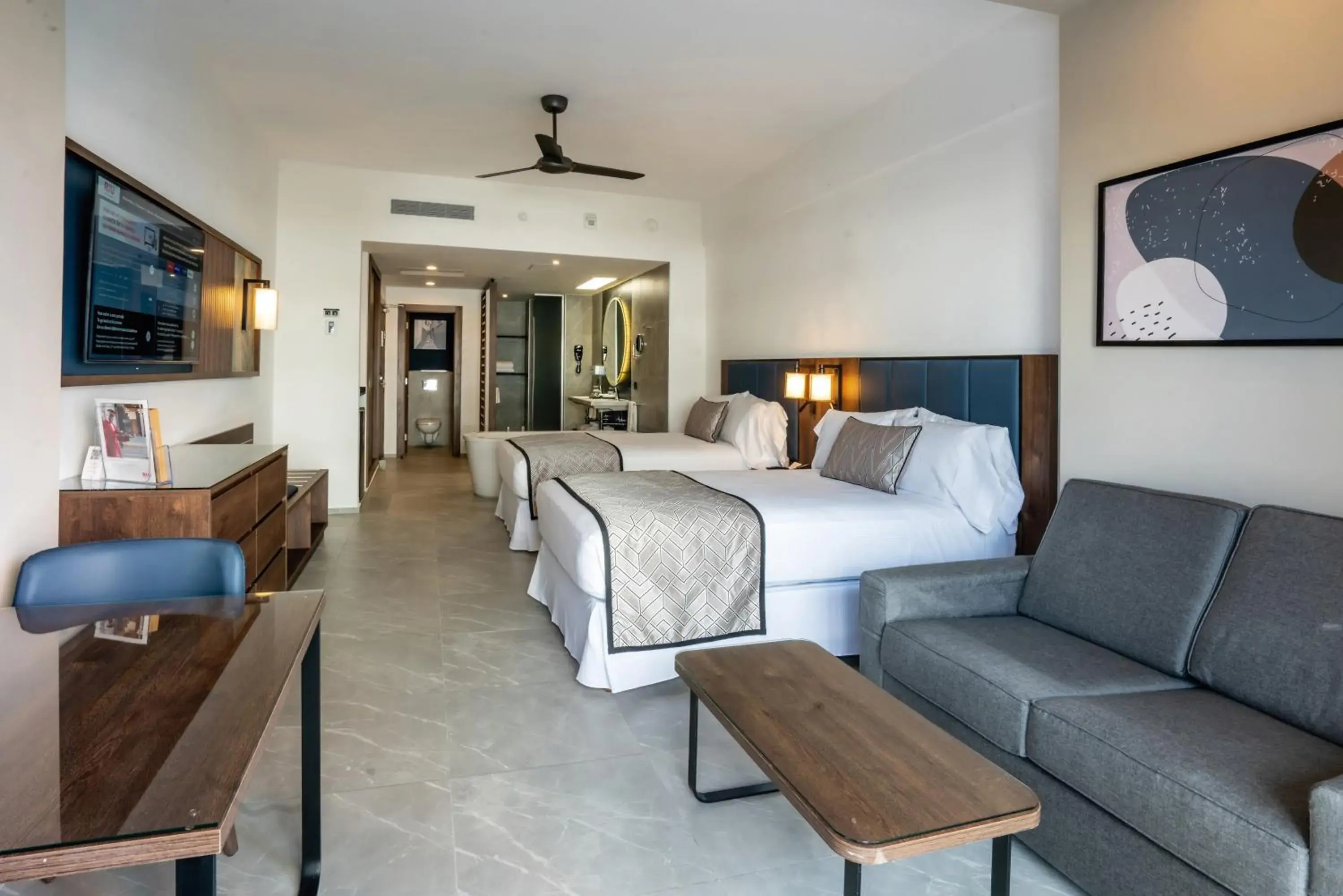 Photo of the whole room, Bed in Riu Palace Kukulkan - Adults Only - All Inclusive Photo of the whole room, Bed in Riu Palace Kukulkan - Adults Only - All Inclusive