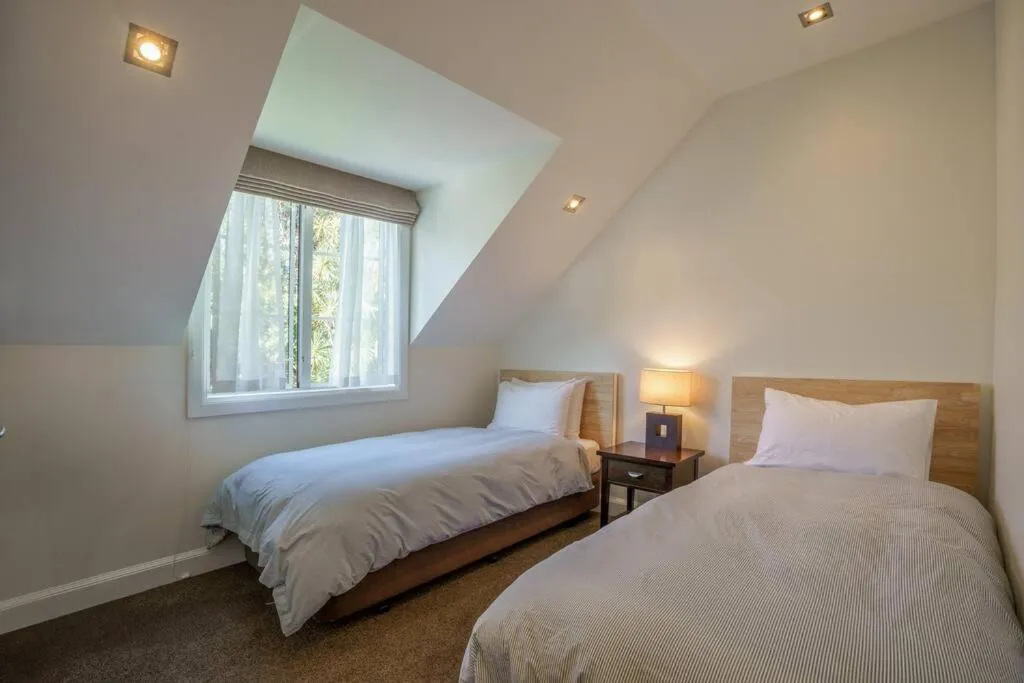 Bed in Capital Cottage 2-4 Bedroom- Russell Cottages Collection