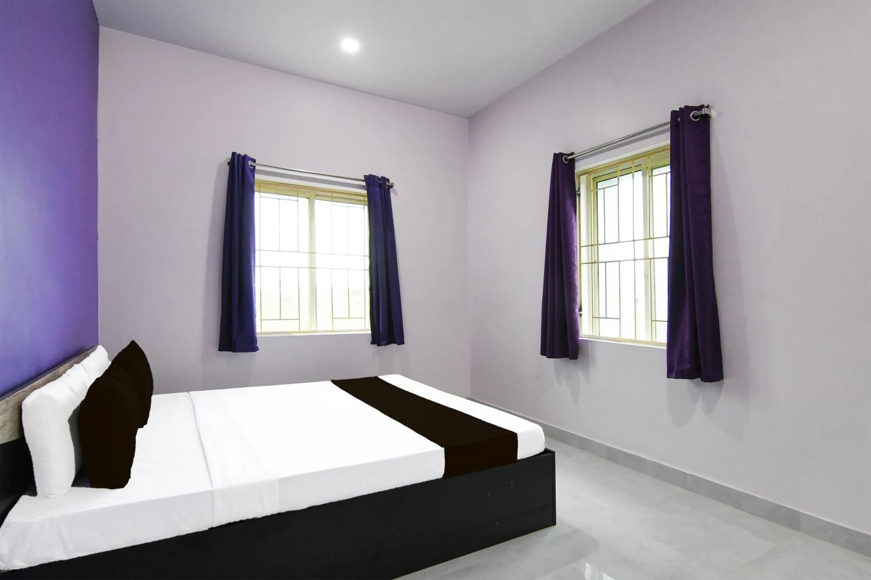 Bedroom, Bed in Super Hotel O MNJ Mansion