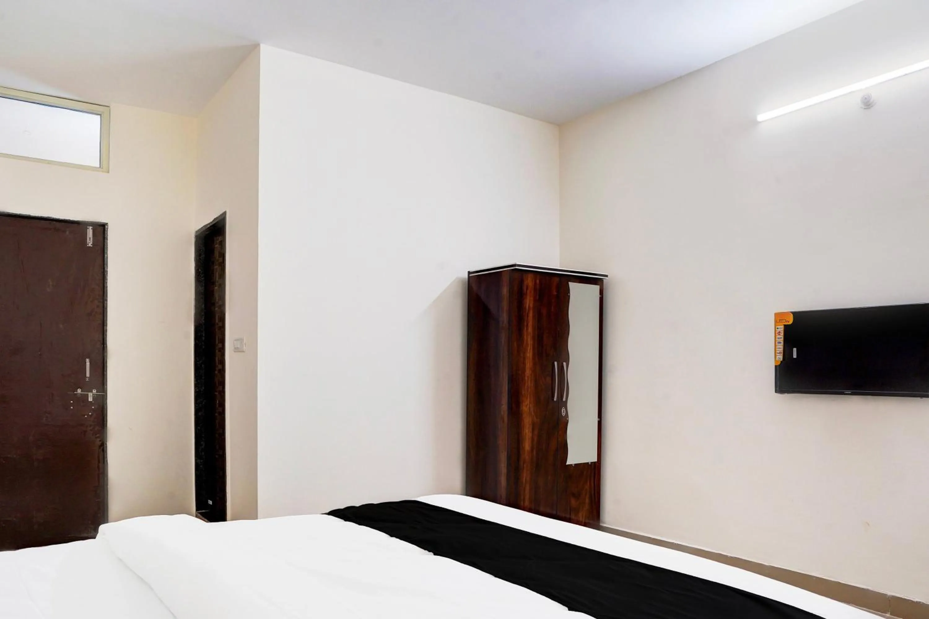 Bedroom, Bed in Super Hotel O MAZENTA PALACE