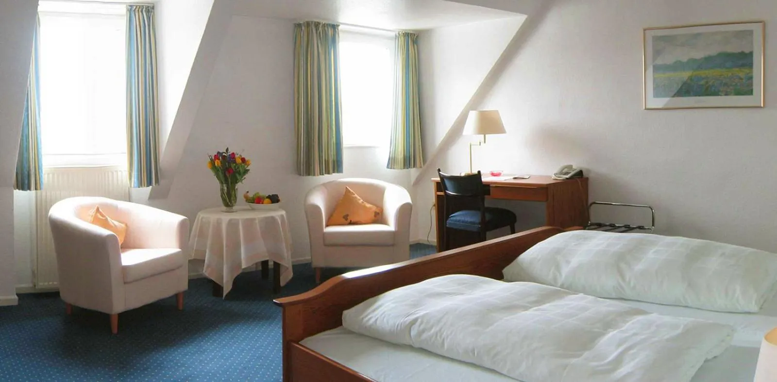 Bed in Posthotel Monegro