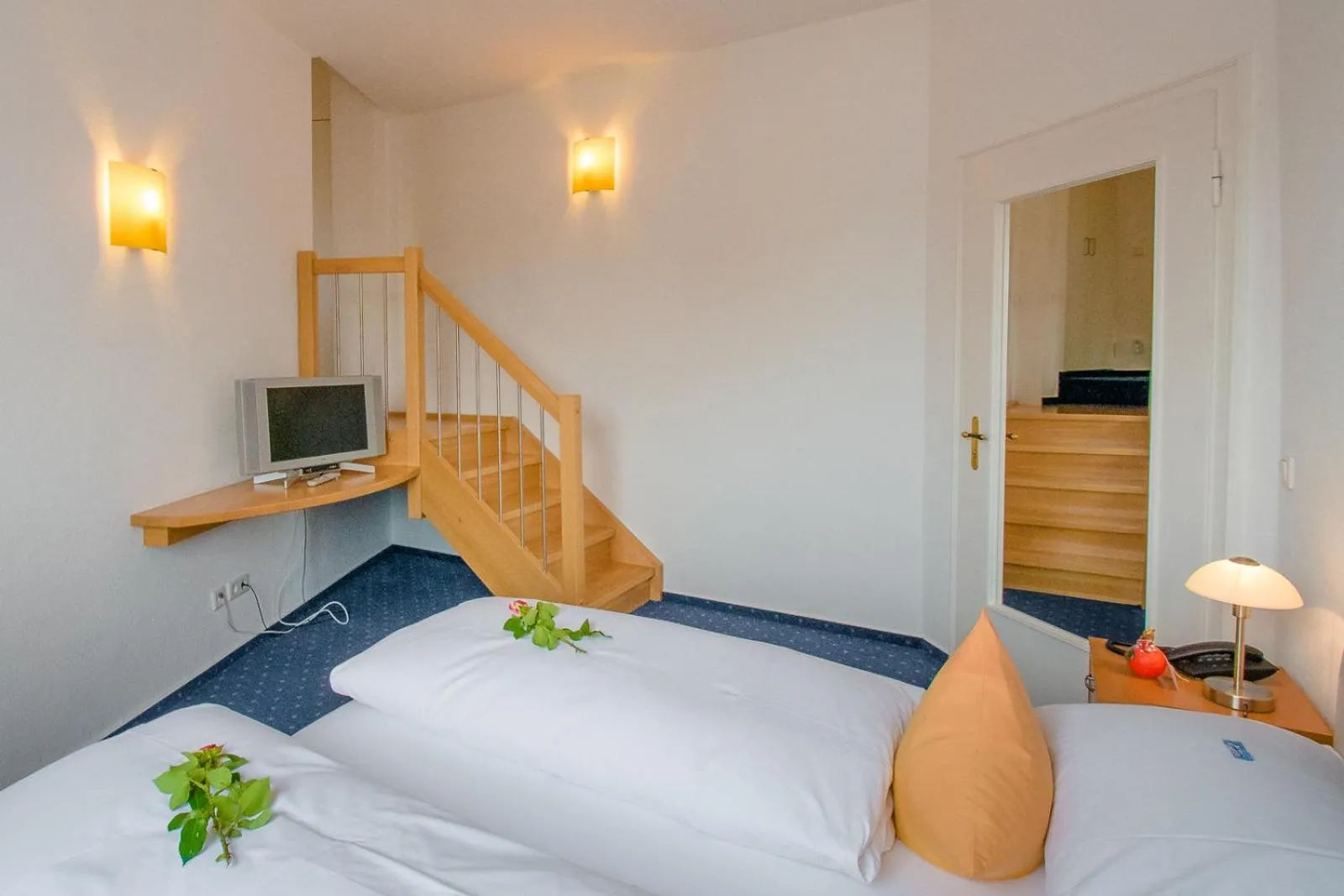 Bed in Posthotel Monegro