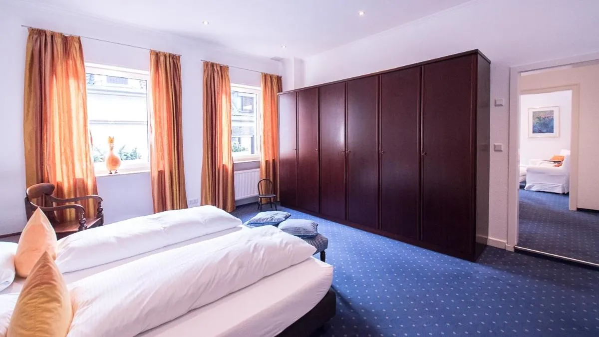 Bed in Posthotel Monegro