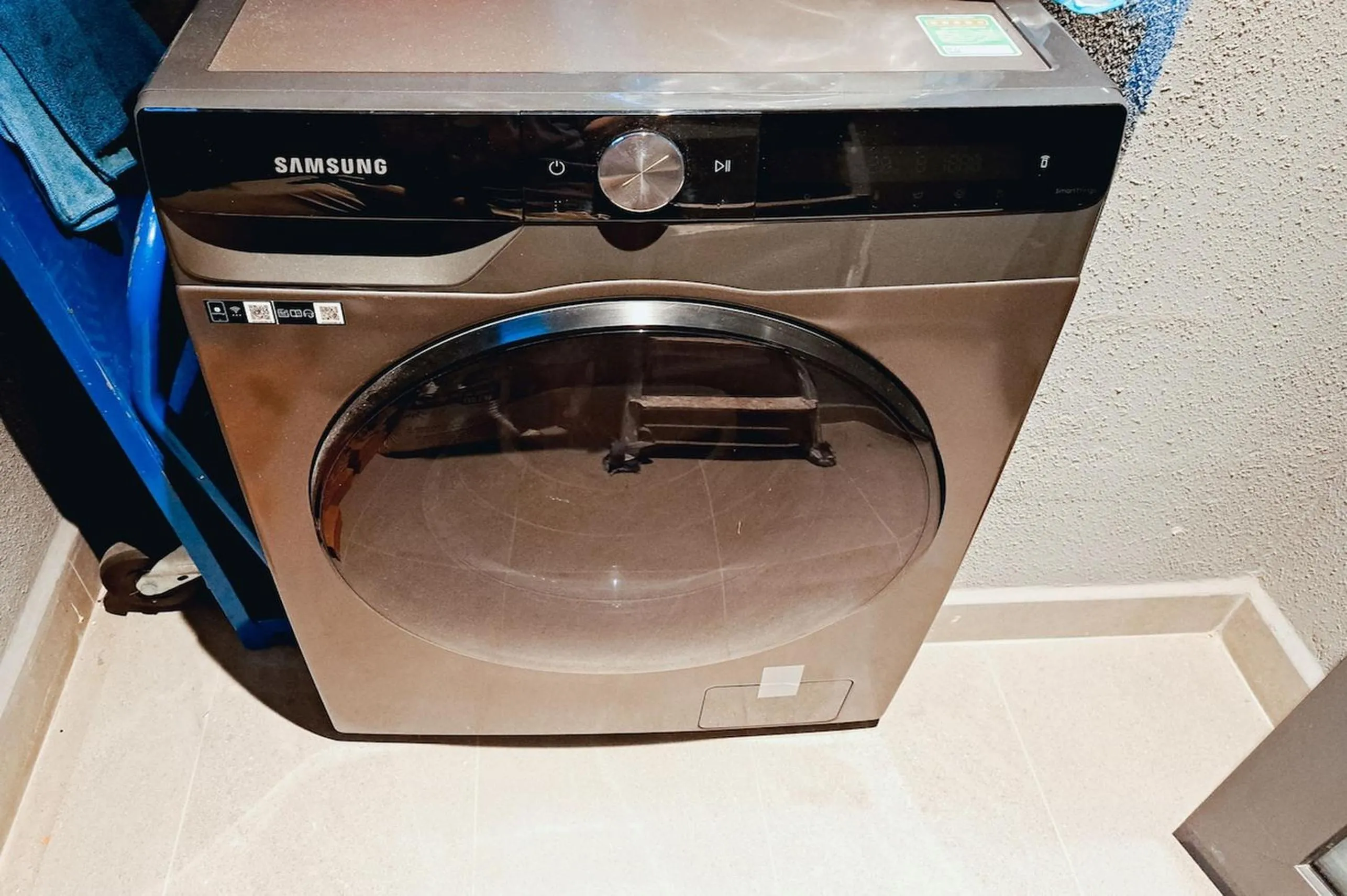washing machine in The Metropole - Horizon View Riverside D2