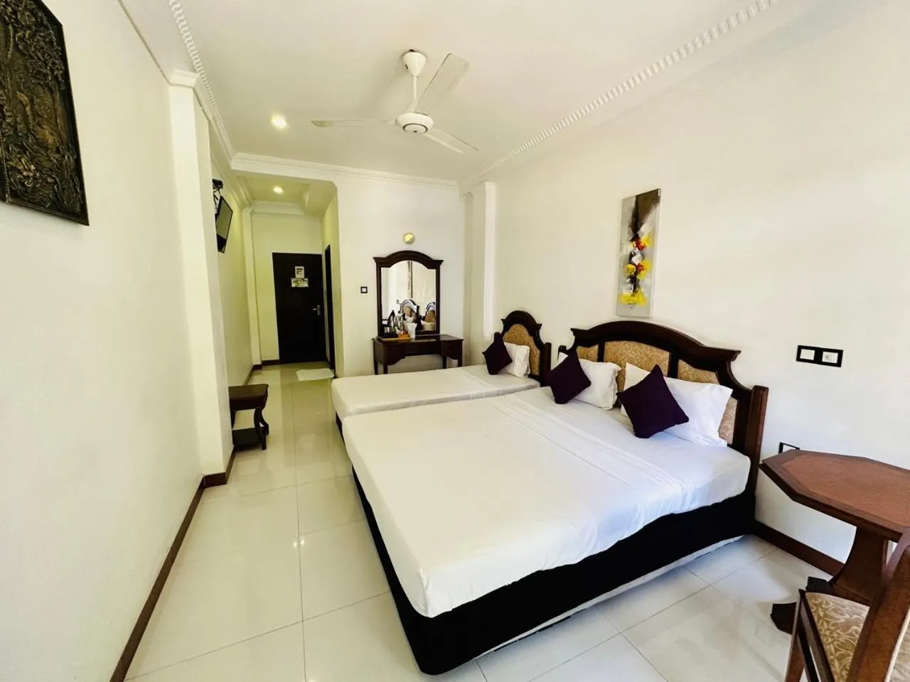 Bed in Gallery City Hotel
