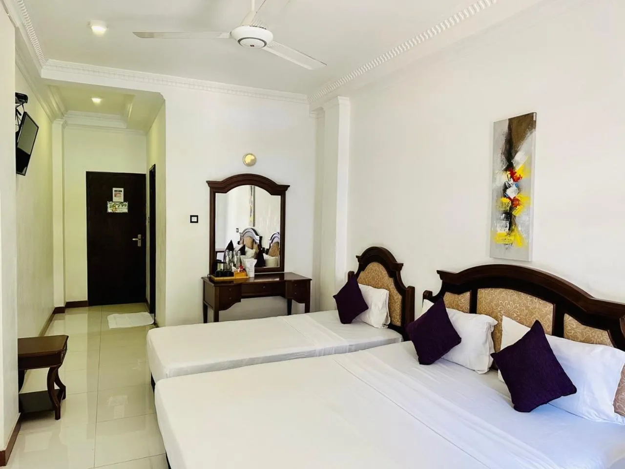Bed in Gallery City Hotel