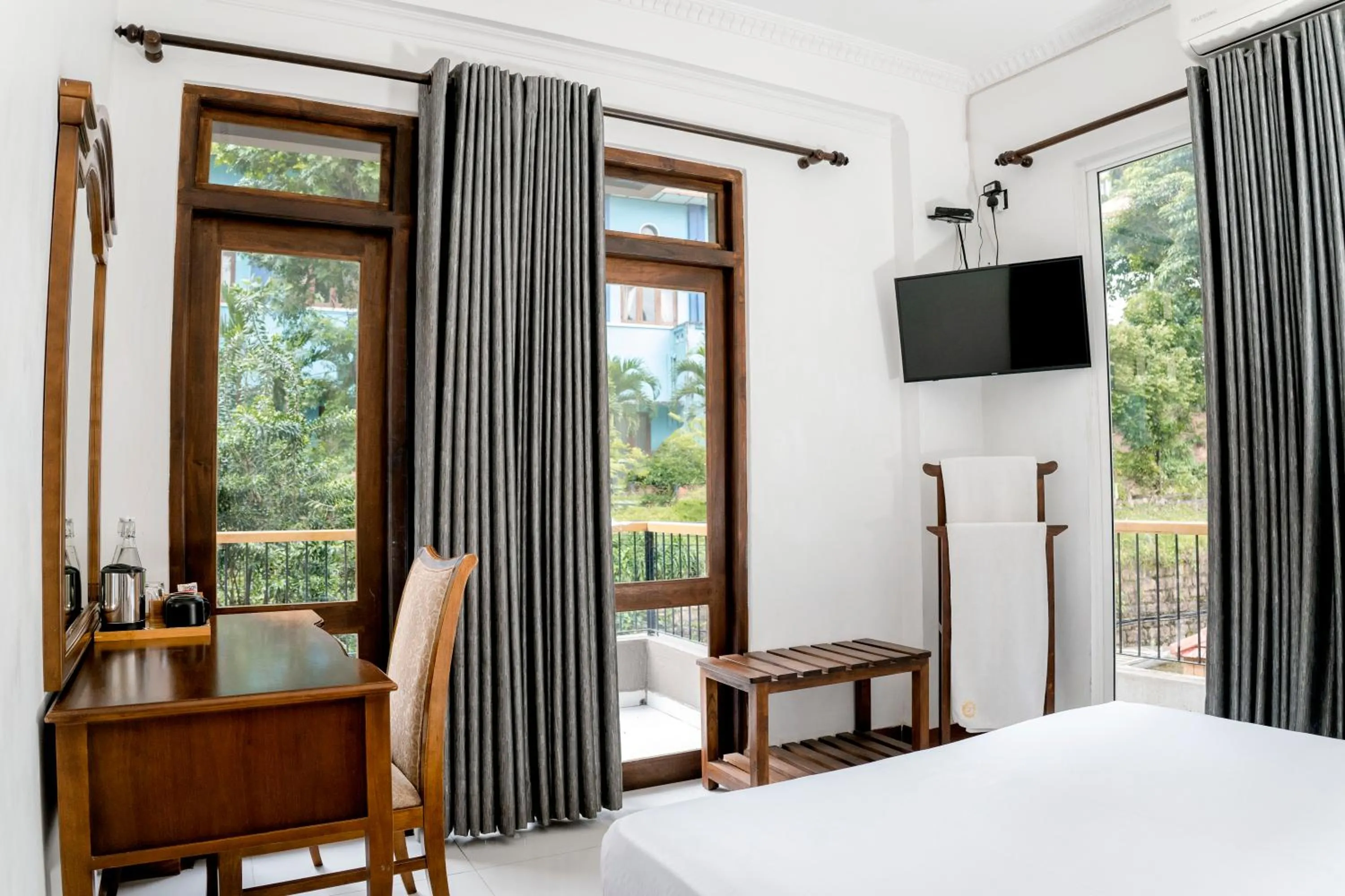 Bed in Gallery City Hotel